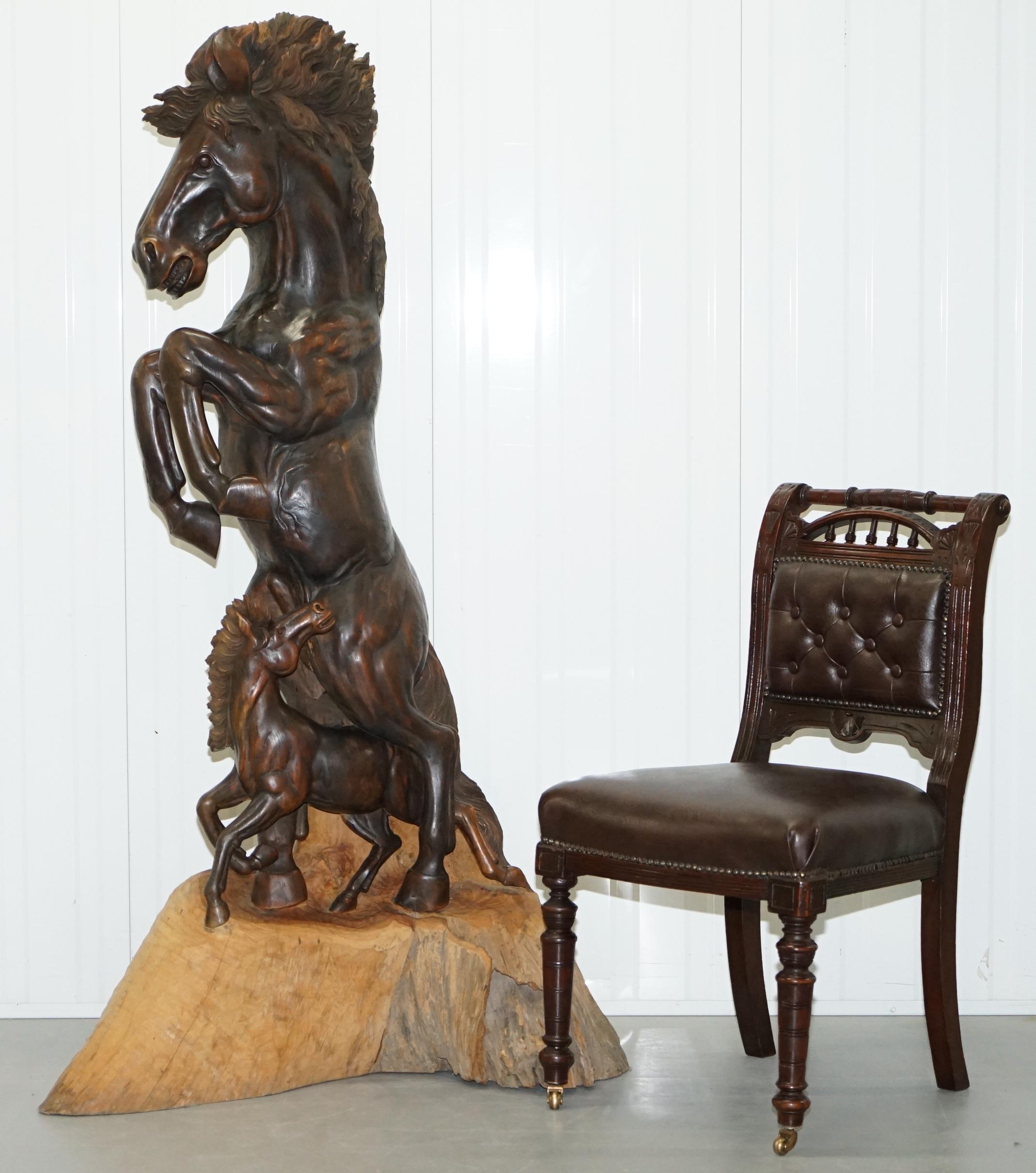 We are delighted to offer for sale this one of a kind hand carved from a felled tree sculpture of a rearing horse and a foal calf

A truly mouth-wateringly beautiful piece, the horse ha such as a sense of movement and flow about it with the main