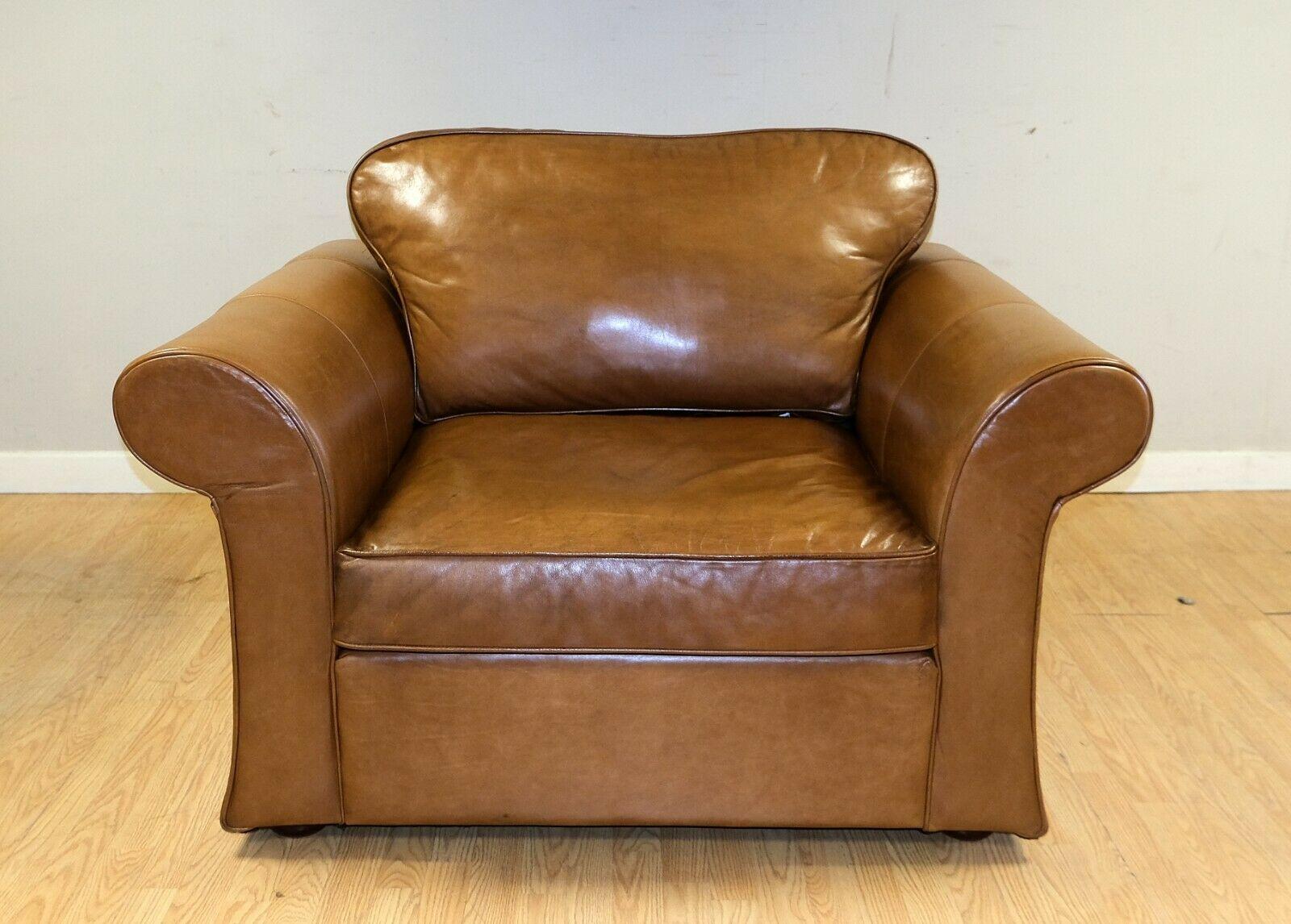 We are delighted to offer for sale this lovely leather armchair in a lovely light brown colour.

This comfortable and solid armchair is presented in a nice soft colour along with real leather. The curved arms are simple and at the same time, with