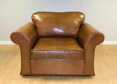 Stunning Tan Leather Armchair on Scroll Arms & Wooden Feet