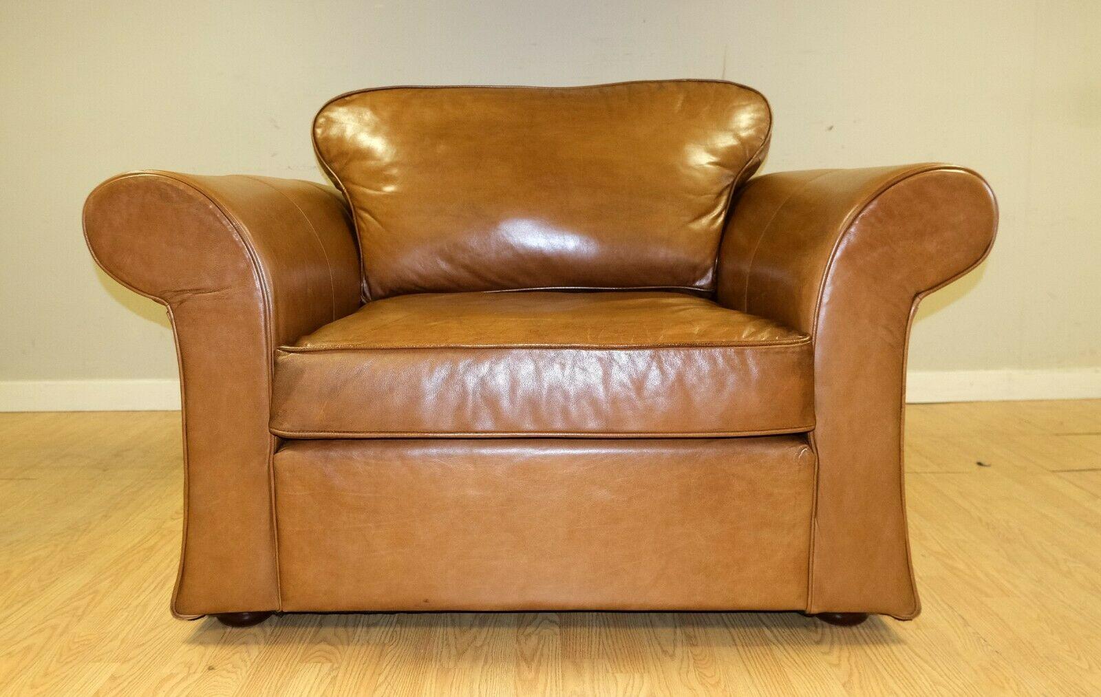 English Stunning Tan Leather Armchair on Scroll Arms & Wooden Feet