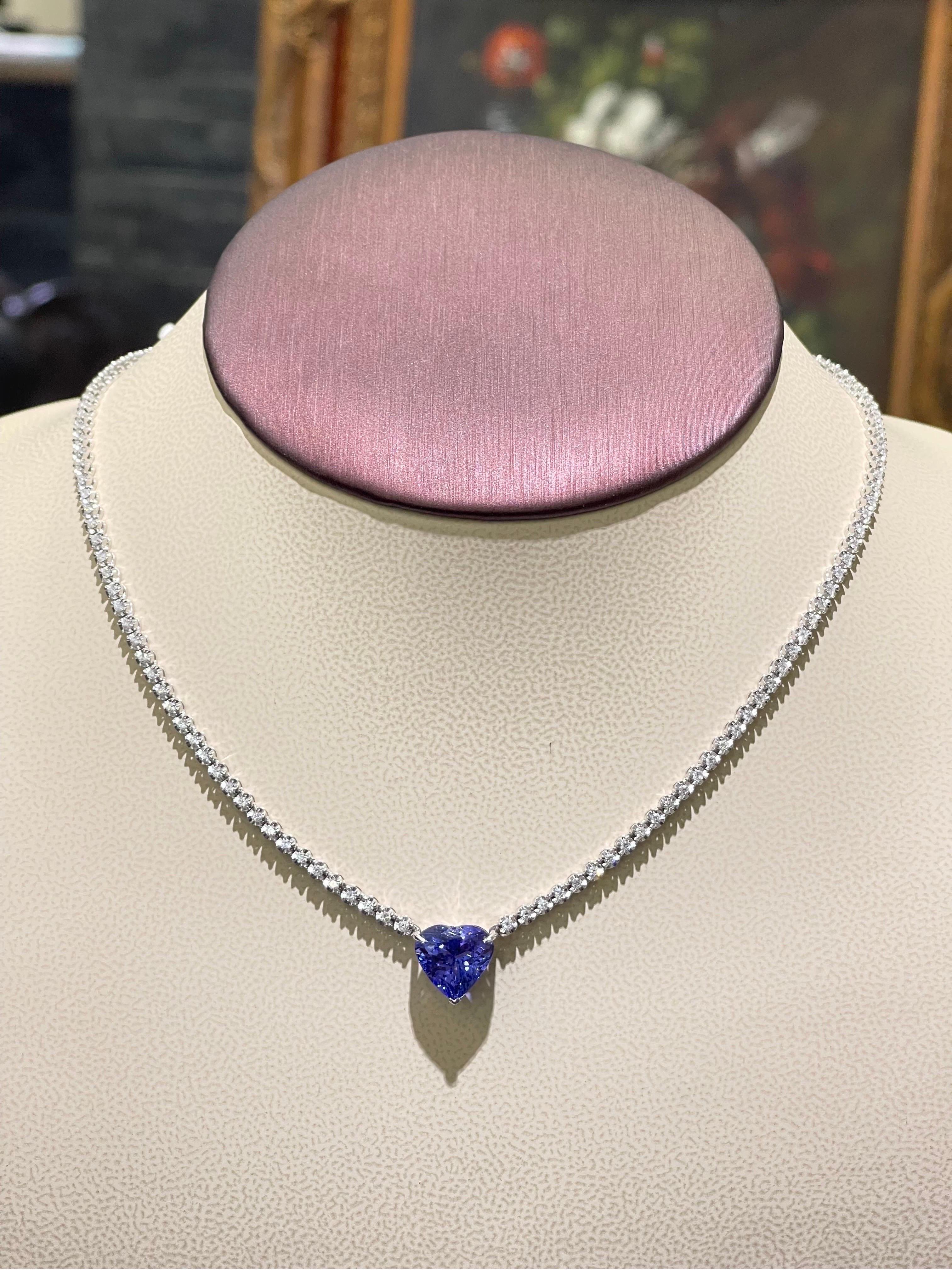 Stunning Tanzanite And Diamond Necklace In 18k White Gold .

- 1.98 diamond total carat weight,

- 4.5 carats heart shaped tanzanite ,

- length of the necklace is 15.75”