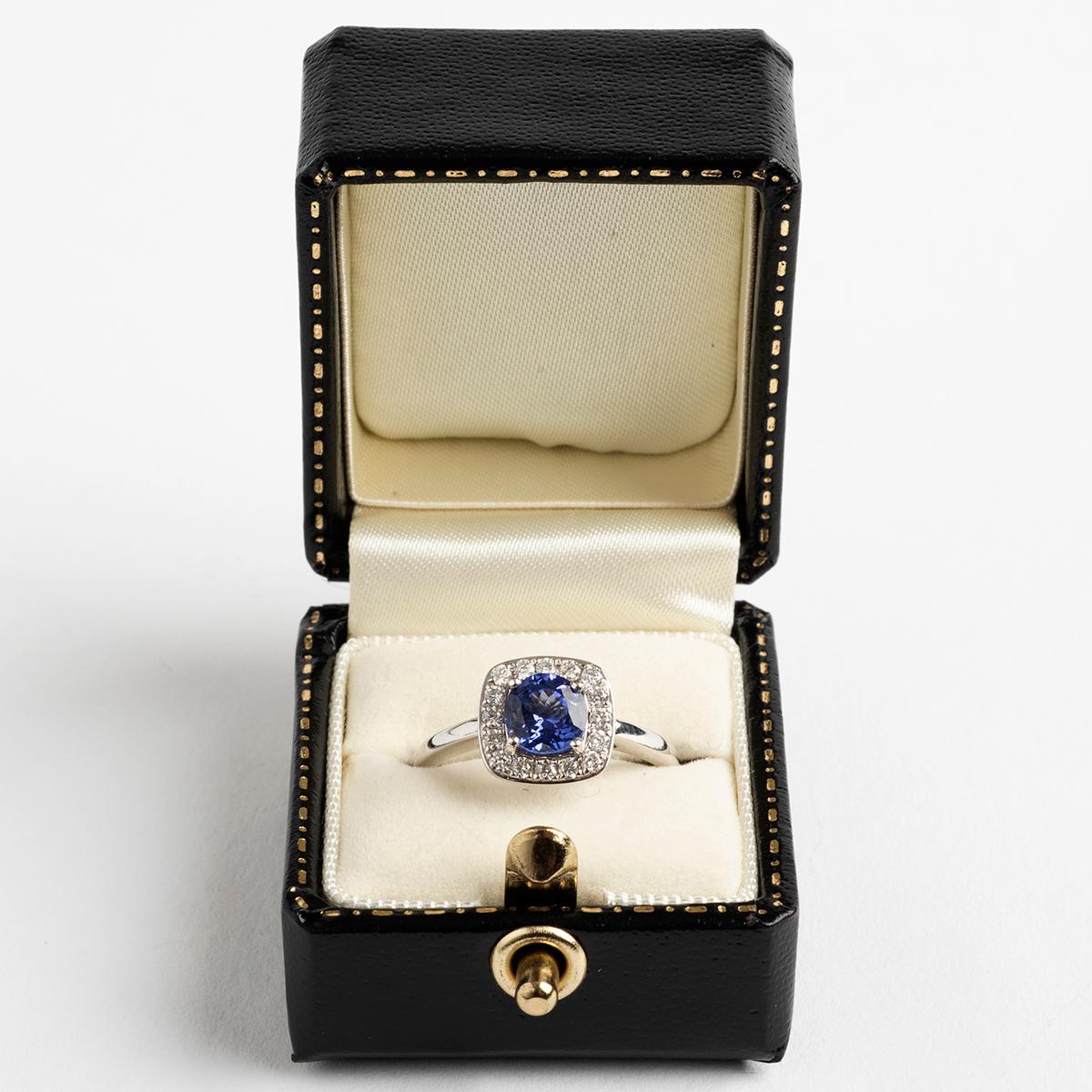 
Our beautiful modern cluster 18k white gold ring features a round tanzanite (est. 78carat) and diamonds (est. .23carat). The band is hallmarked London, 2015 and is ring size M.

A unique piece within our carefully curated Vintage & Prestige fine