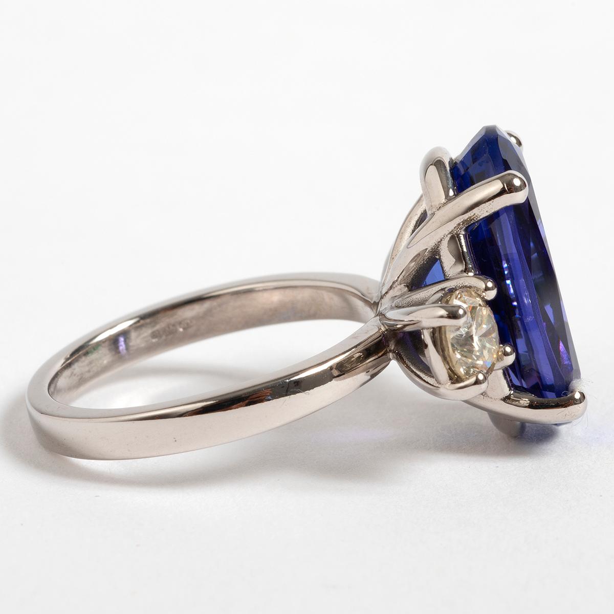 This tanzanite and diamond trilogy ring is truly a beautiful piece. Set in 18carat white gold, tanzanite is approx 7.5carat, diamond is approx 0.50carat. This ring comes in UK size L / US size 5.75.