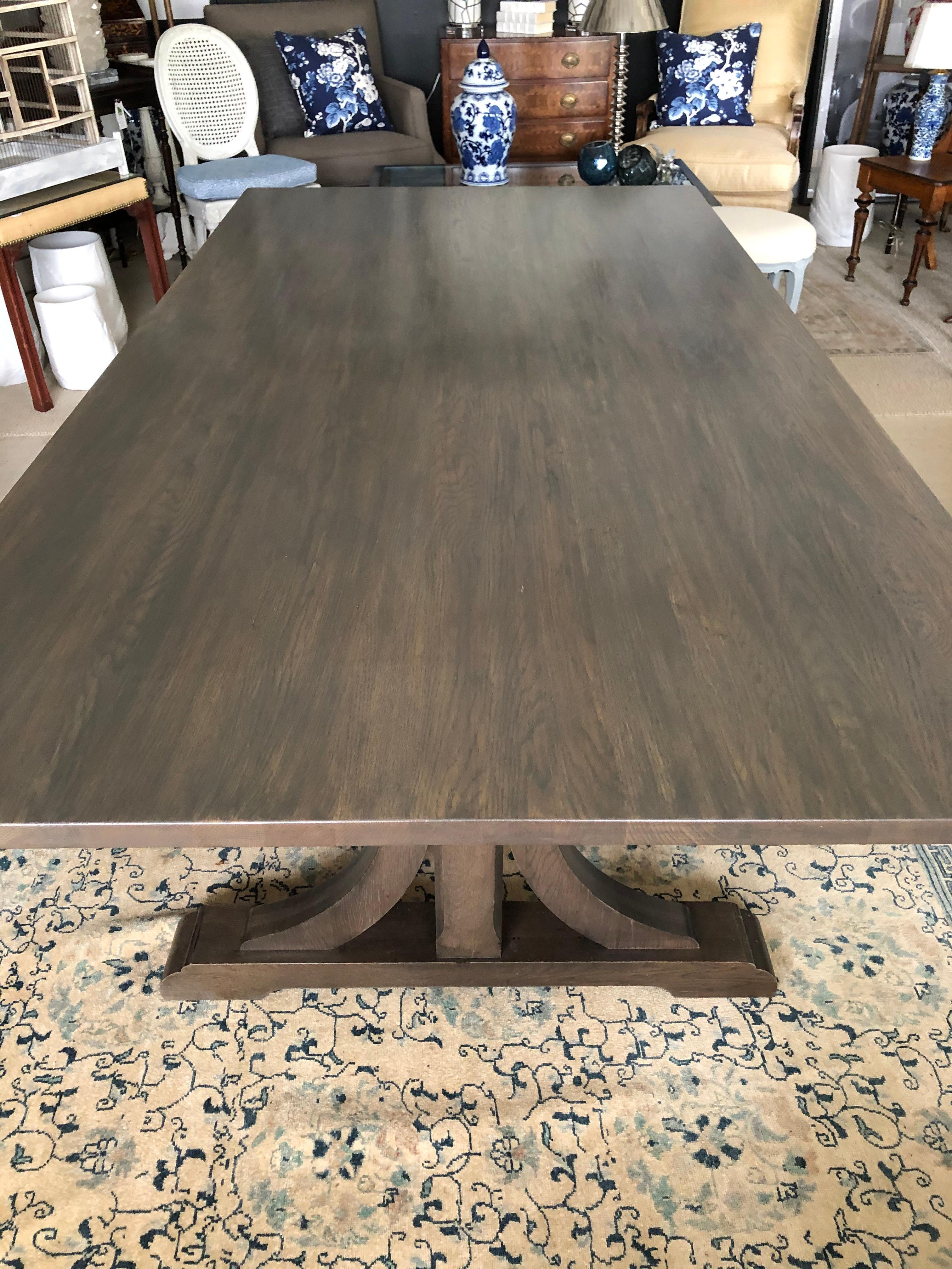 Impressive large sophisticated trestle oak dining table having a distinguished 