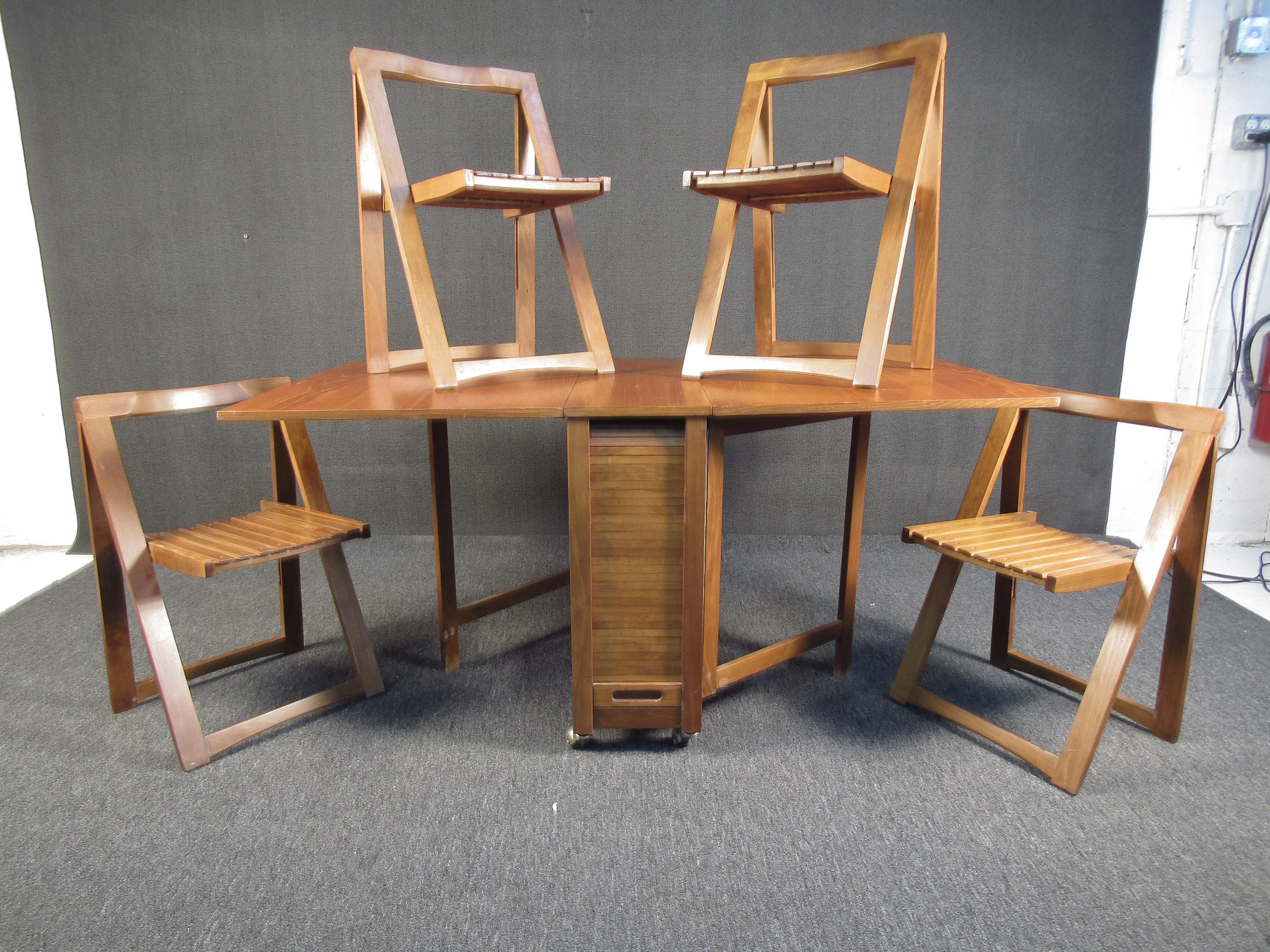 This beautiful apartment-style drop-leaf table comes with a set of four collapsable chairs that store underneath. With an impressive amount of table space for how compact this set stores it is both functional and beautiful. Please confirm the item