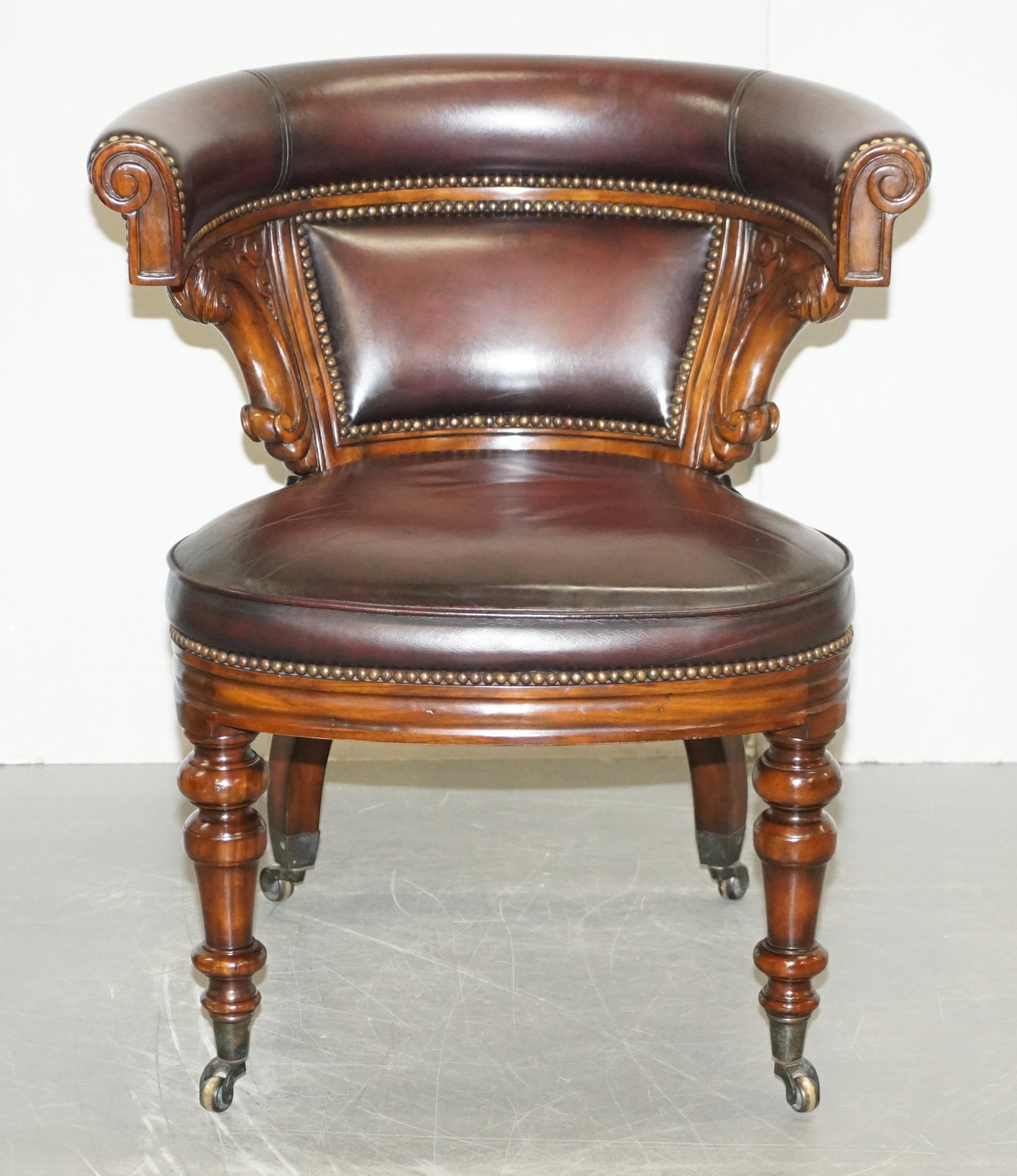 We are delighted to offer this lovely Theodore Alexander Oxblood leather horseshoe shaped directors office chair

A very well made decorative and comfortable chair, it looks amazing from every angle, the timber patina is sublime as is the quality