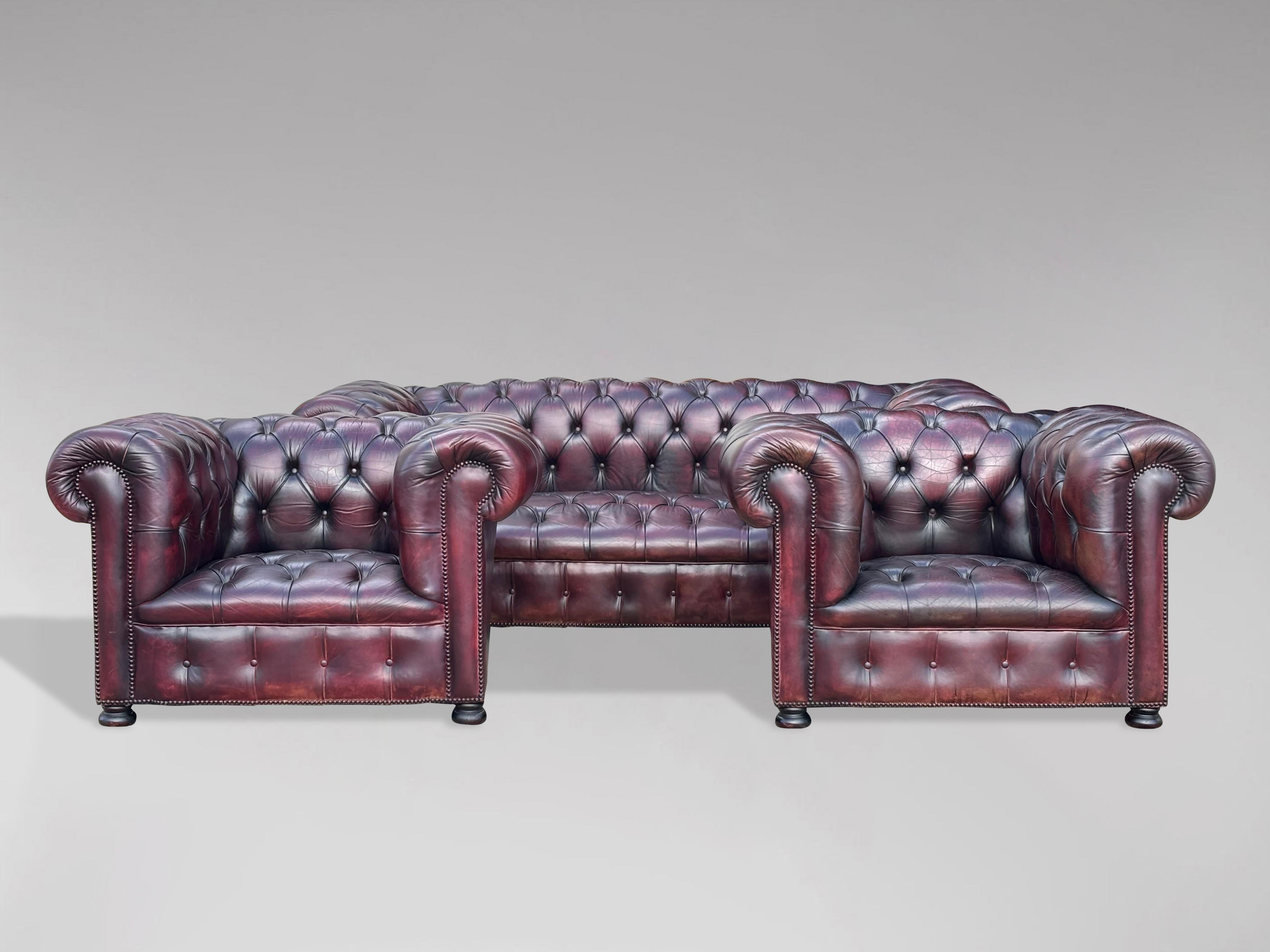 A good quality mid 20th century prune colour leather vintage chesterfield suite. With the original prune burgundy leather hide that has been cleaned and polished giving a lovely soft and sumptuous feel to the quality leather. Comprising a large