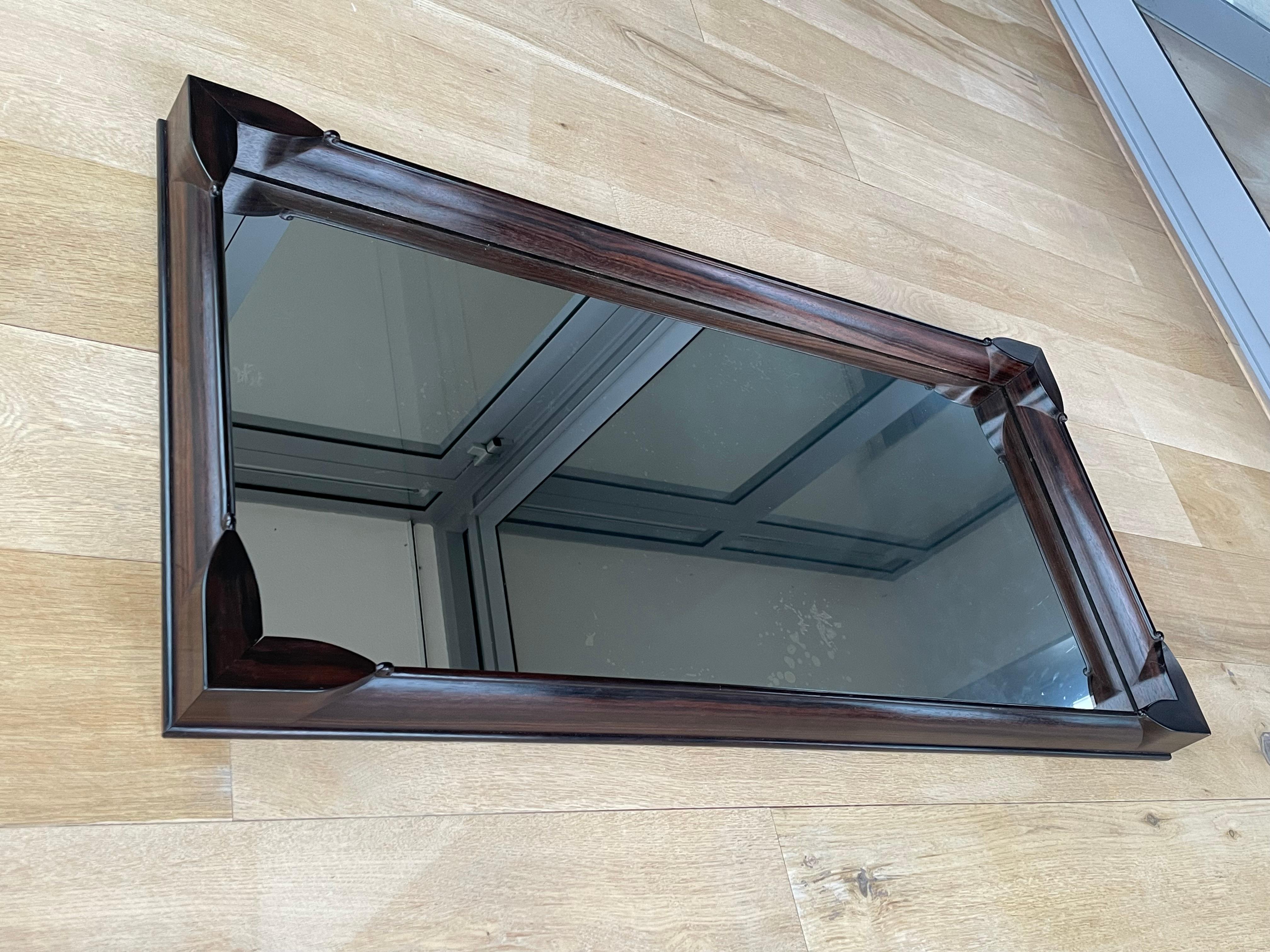 One of a kind and truly stunning Arts and Crafts wall mirror.

This hand-crafted and hand-carved, Arts and Crafts wall mirror is one of the most stylish antiques that we (or you) will ever own. People who don't know about antiques in general and