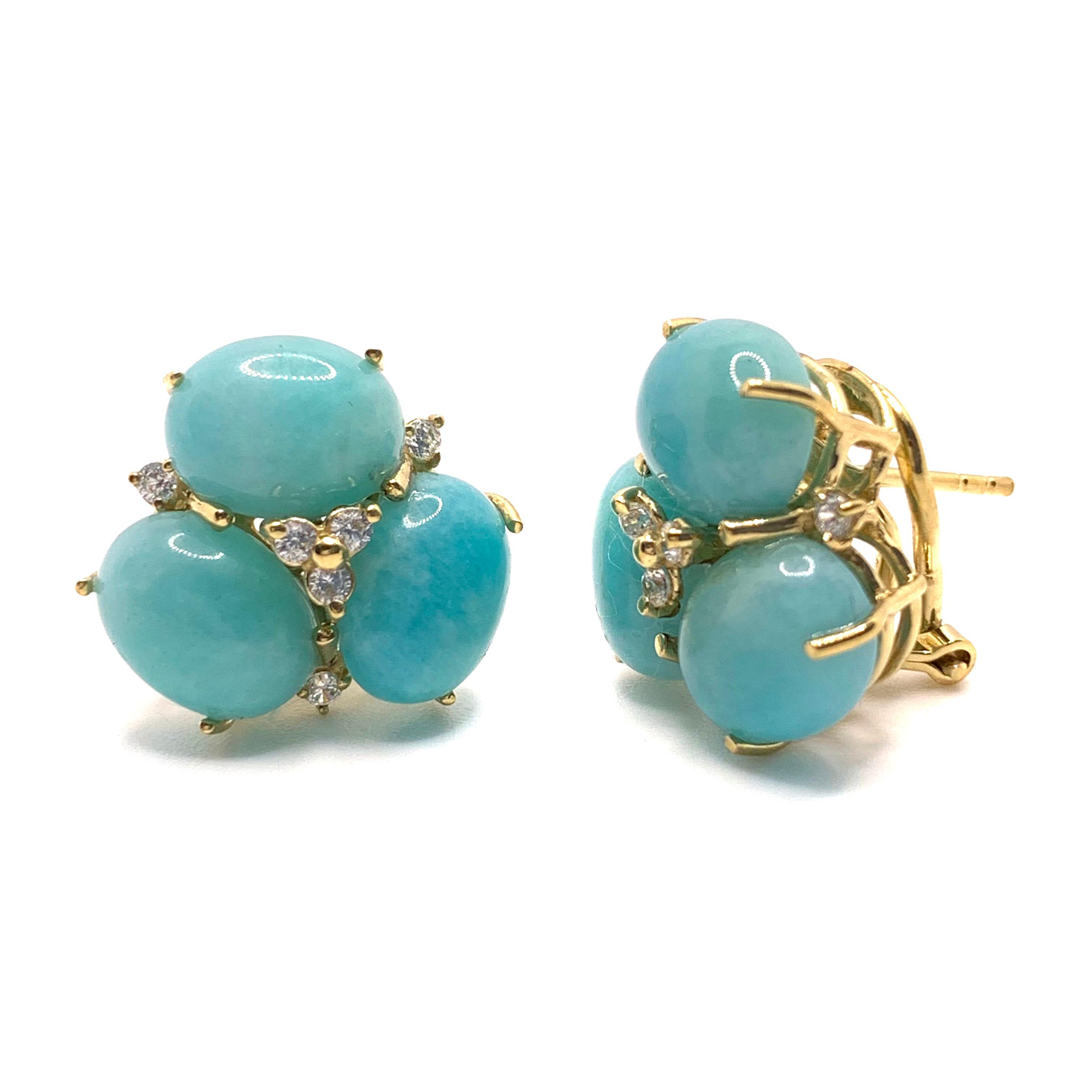 These stunning pair of earrings feature sets of oval cabochon-cut amazonite adorned with round simulated diamonds, handset in 18k yellow gold vermeil over sterling silver. The amazonite stones have vibrant blue-green hue and produce beautiful shiny