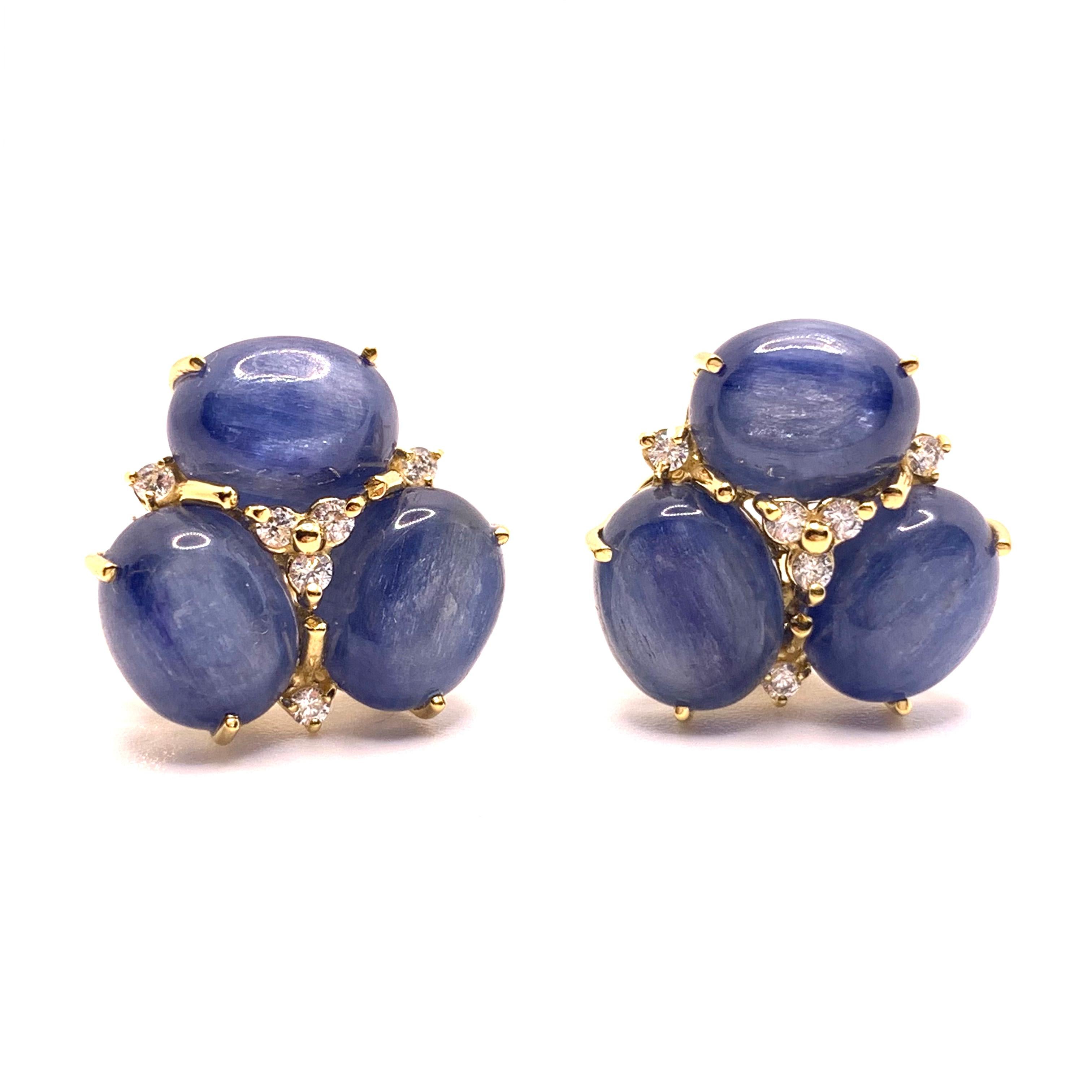 These stunning pair of earrings feature sets of oval cabochon-cut blue kyanite adorned with round simulated diamond, handset in 18k yellow gold vermeil over sterling silver. The oval kyanite stones have rich blue sapphire hue and produce beautiful