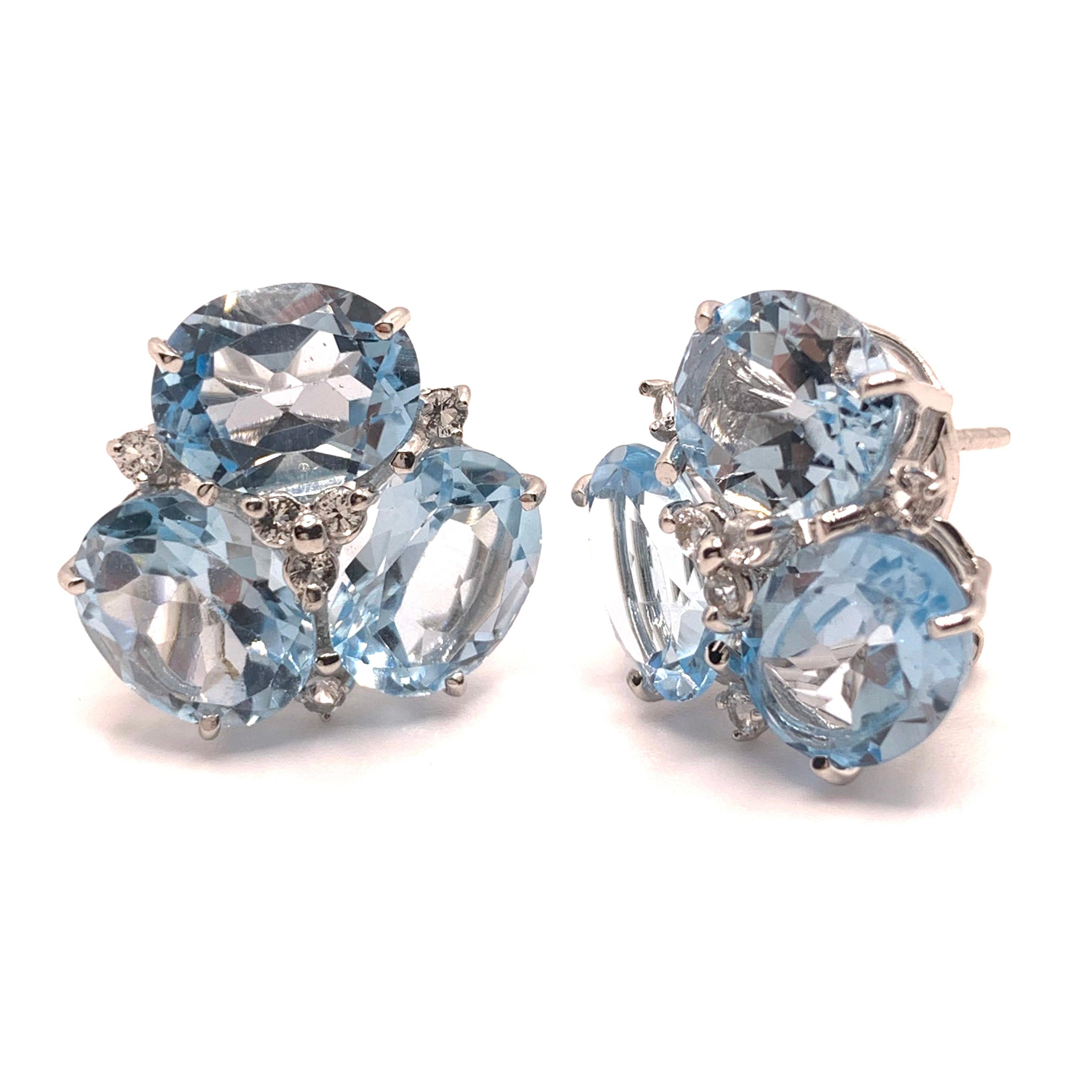 Contemporain Superbes boucles d'oreilles Topaze bleue triple ovale en vente