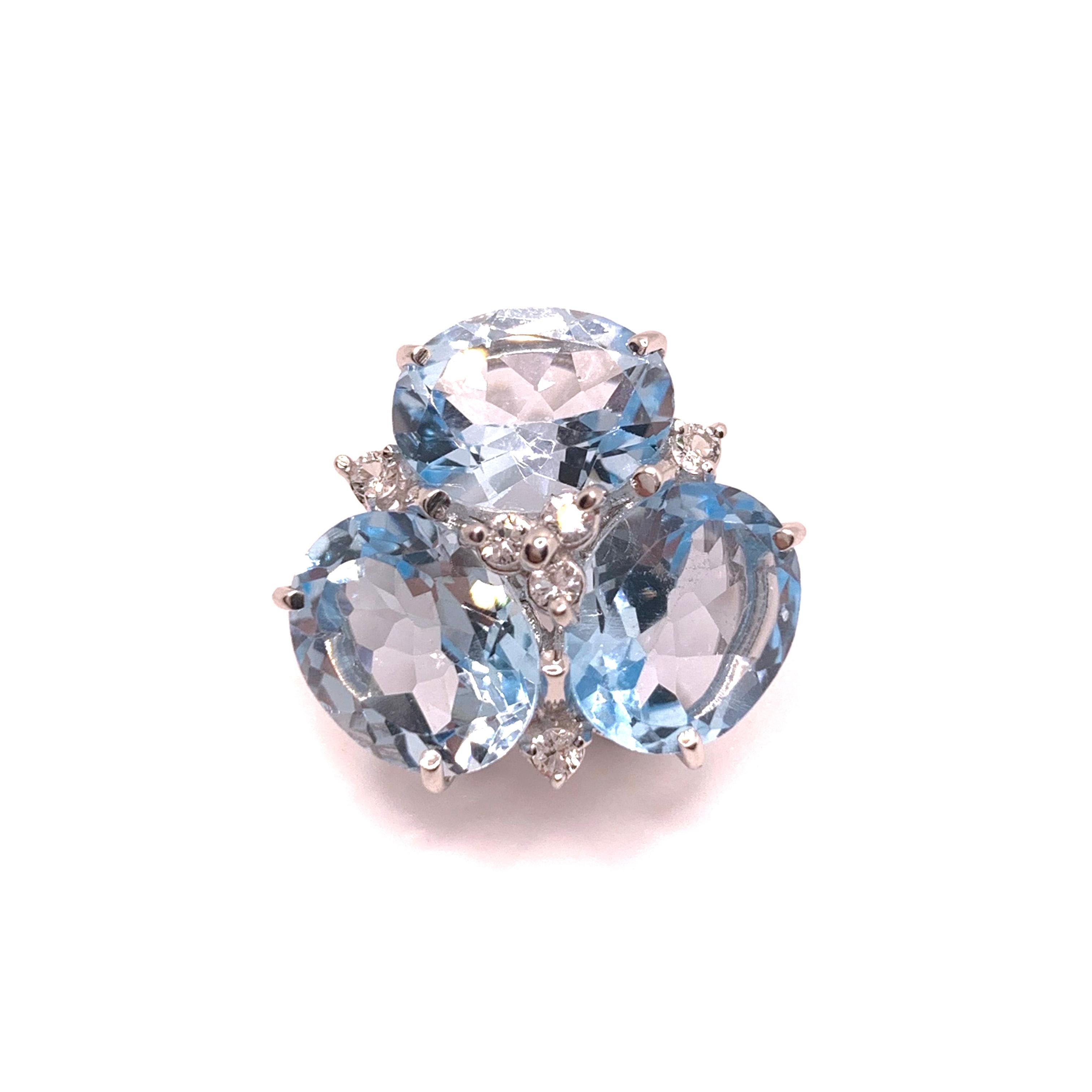 Taille ovale Superbes boucles d'oreilles Topaze bleue triple ovale en vente