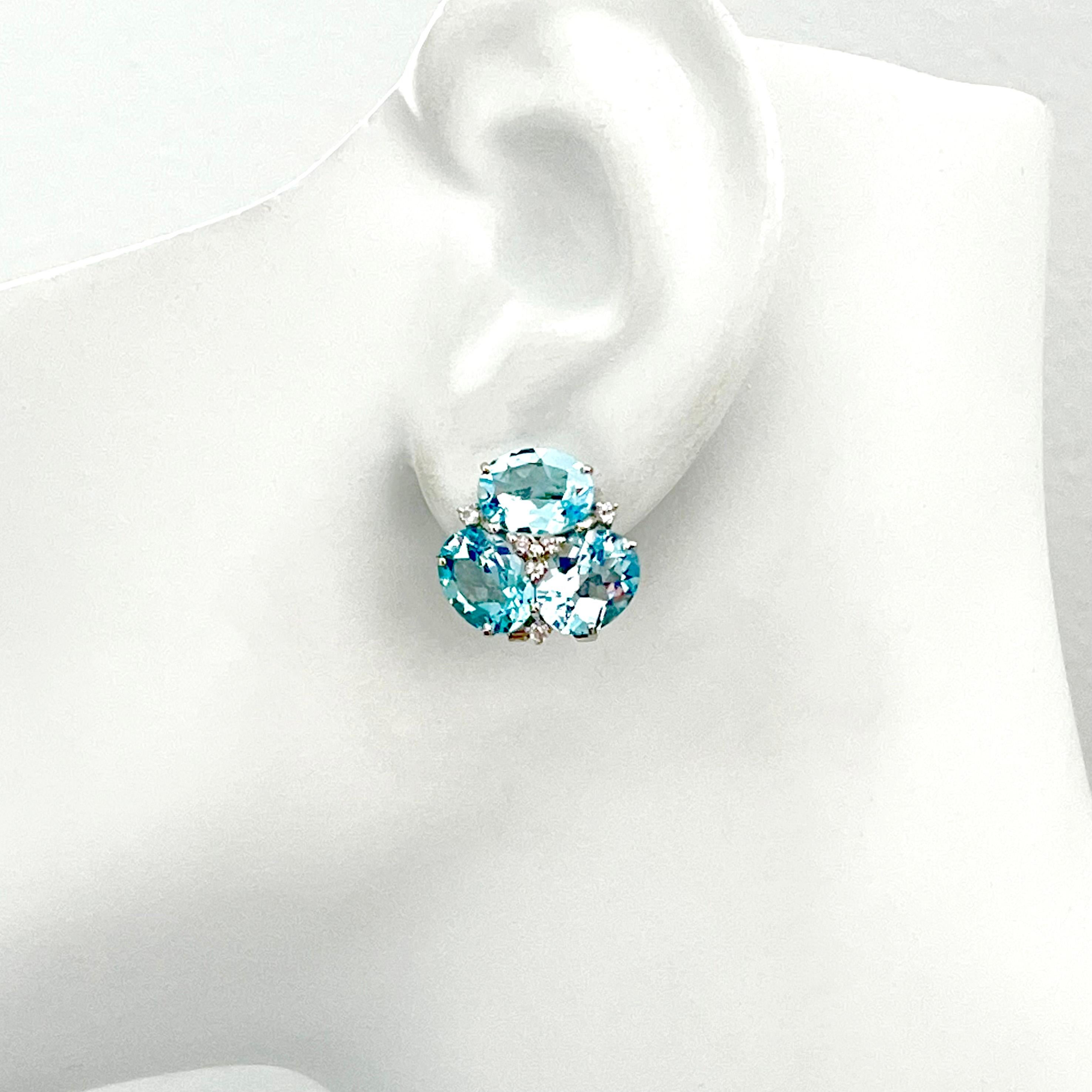 Superbes boucles d'oreilles Topaze bleue triple ovale en vente 1