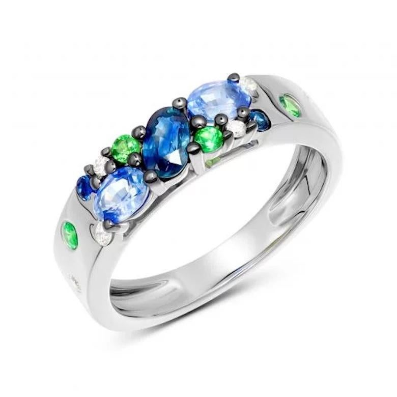 Ring White Gold 14 K (Matching Earrings Available)

Diamond 6-0,06 ct 
Blue Sapphire 1-0,12 ct
Blue Sapphire 2-0,25 ct
Blue Sapphire 2-0,47 ct
Tsavorite 4-0,13 ct

Weight 3,36 grams
Size 6.5

With a heritage of ancient fine Swiss jewelry traditions,