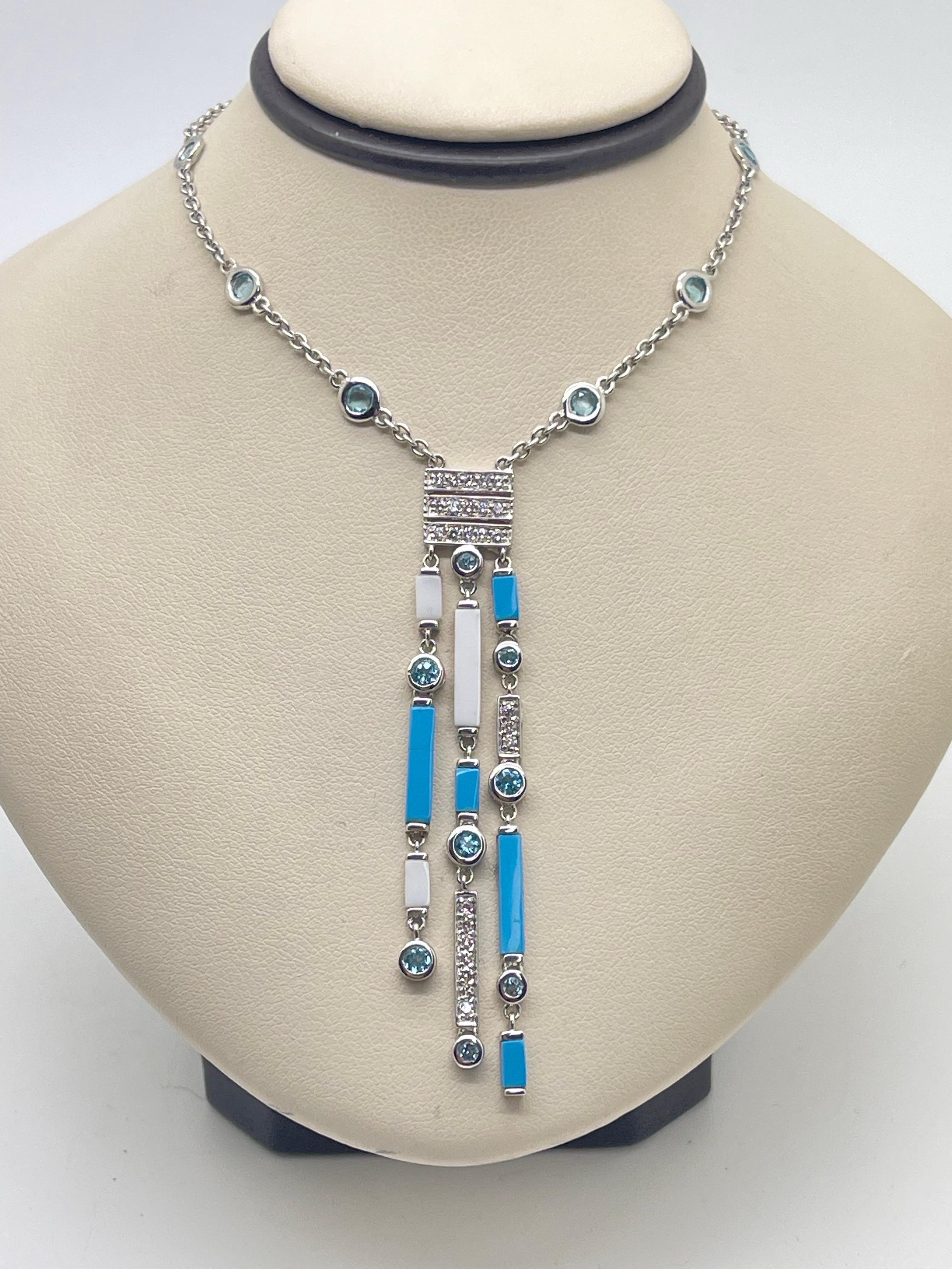 Stunning Turquoise, White Agate & Diamond Necklace with Blue Topaz accents In 18k White Gold.

* 0.32 cts in diamonds,

* 2.65 cts in turquoise/ white agate.

* 1.43 cts in blue topaz.

The length is adjustable 15” or 16”.