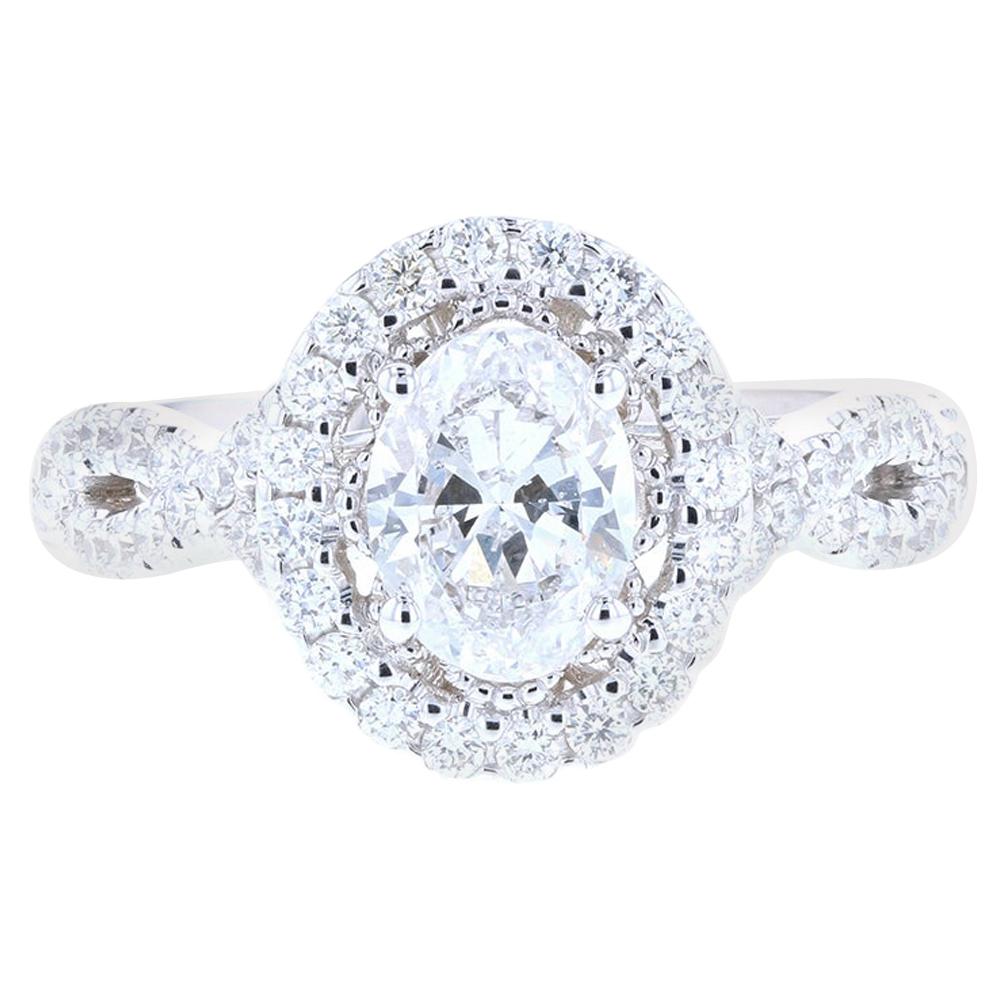 Stunning Twisted Shank Oval Diamond Engagement Ring with Diamond Pave For Sale