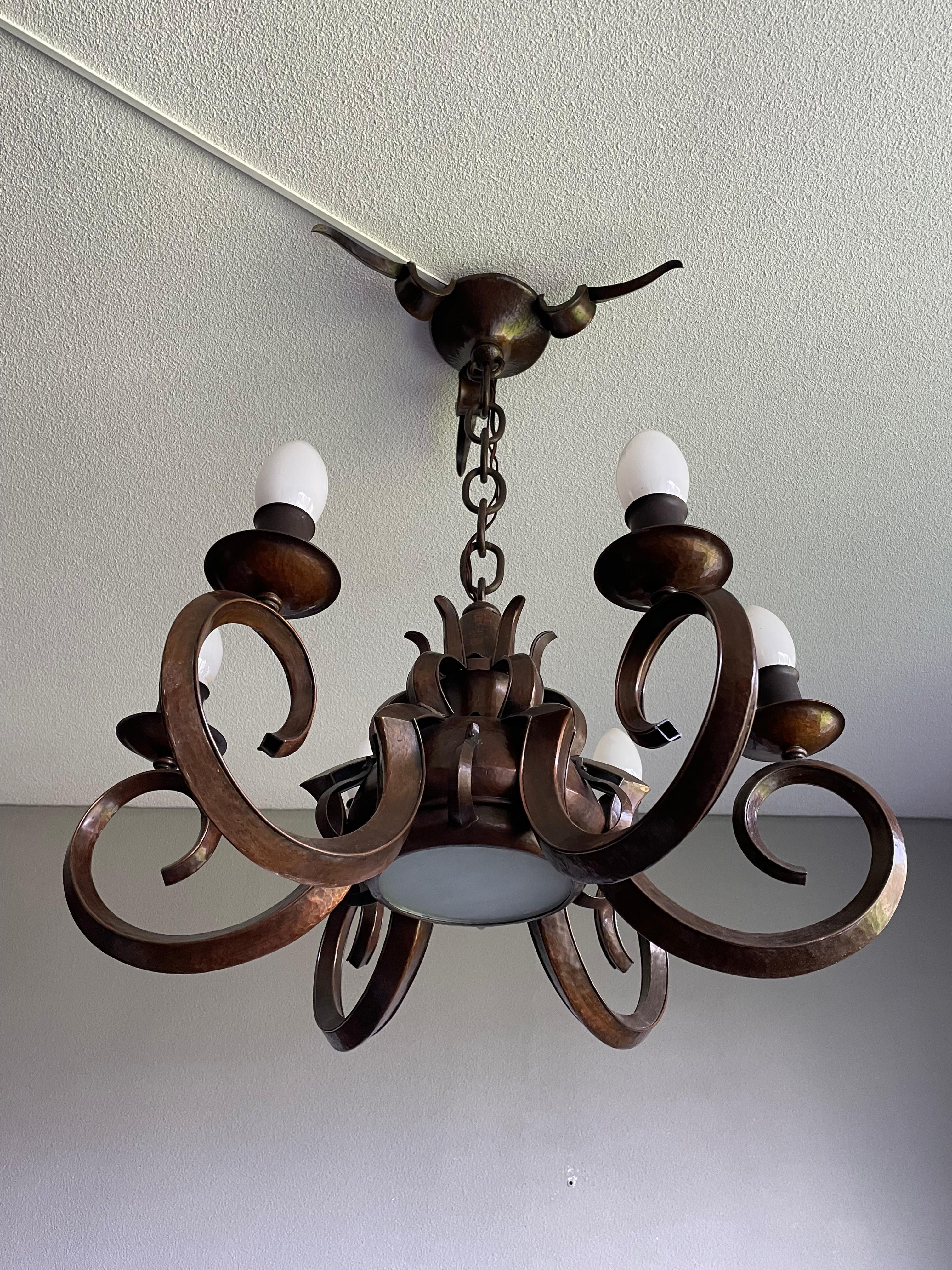 Great looking and amazing workmanship, copper Arts and Crafts pendant.

If you live or work in an Arts & Crafts building and you are looking for the perfect fixture to grace your living or work space then this unique and all handcrafted, seven-light