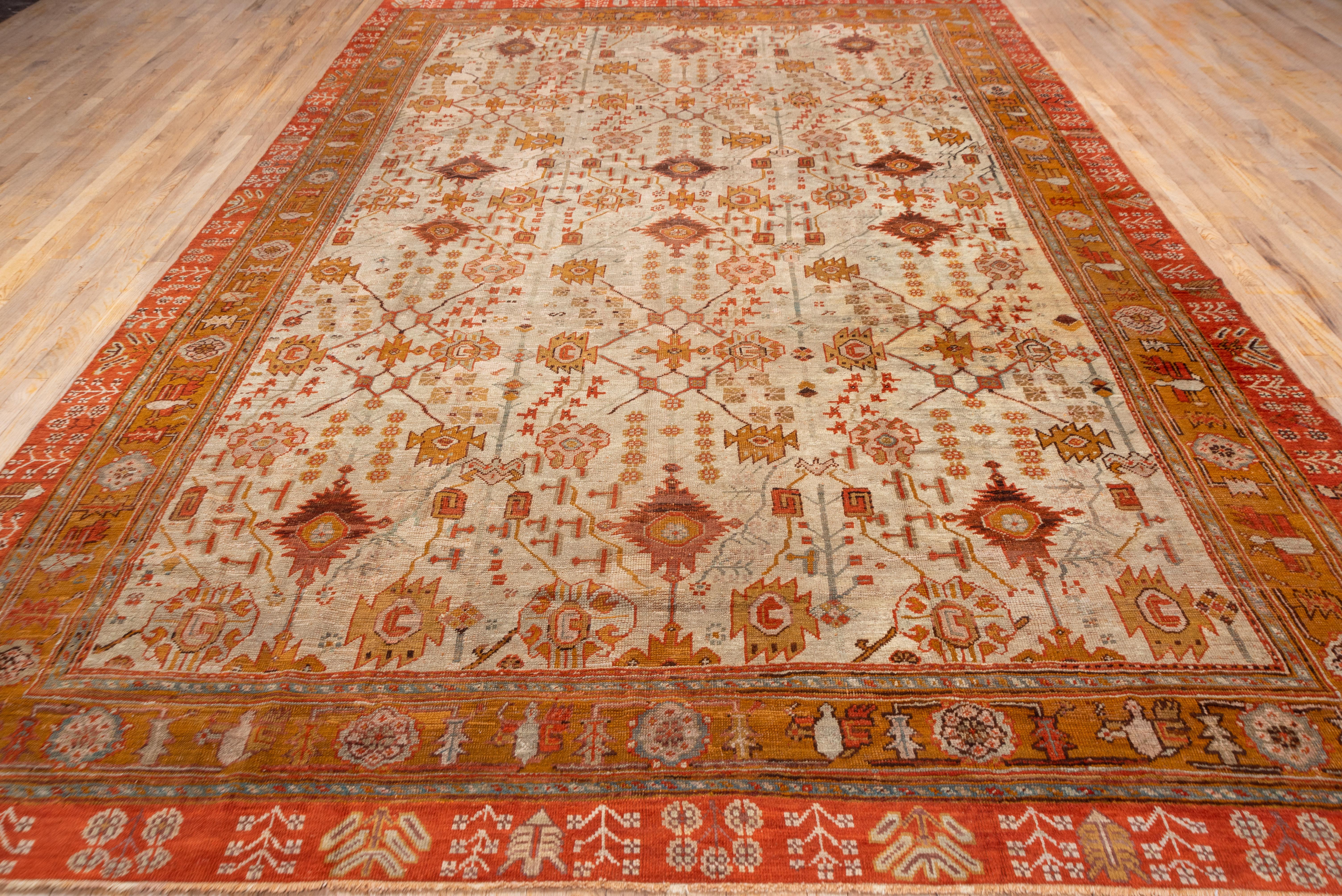 Early 20th Century Stunning & Unusual Antique Oushak Rug, Double Colorful Border, Zanbaki Design For Sale