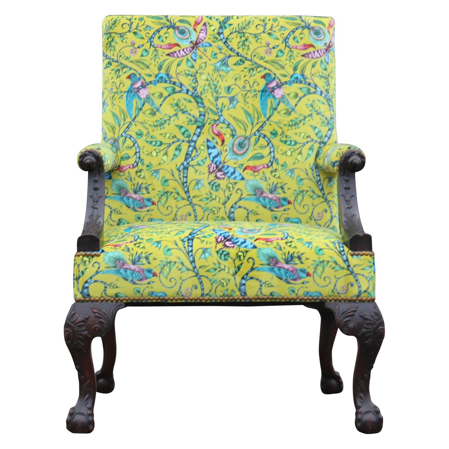 Beautiful 18th century American George the 2nd library / high carved Gainsborough chair. Chair is custom upholstered in whimsical yellow pattern fabric by Clarke & Clarke.  Chair is stamped with 