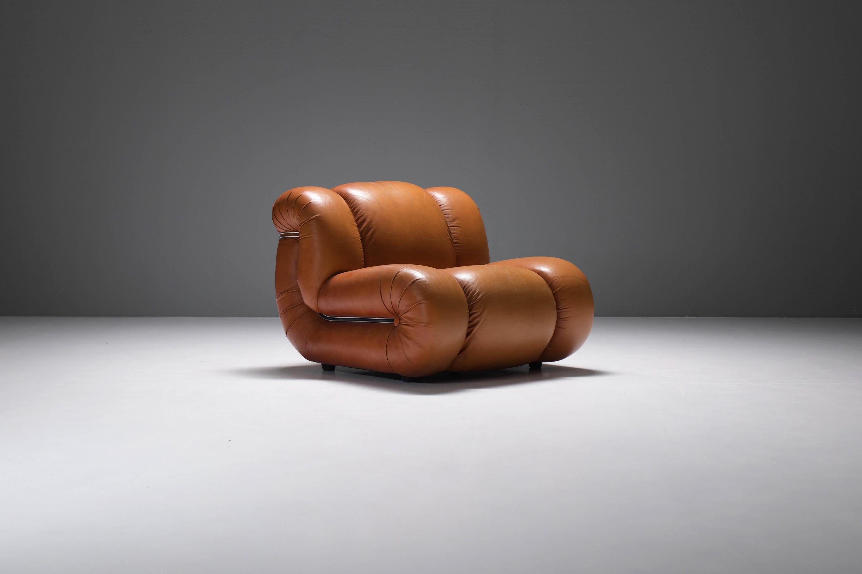 Very comfortable Velasquez lounge chair in its original cognac leather.  Stunning patina! 
Produced by Mimo Padova Italy in 1970s.

This unique design piece from Italy is very comfortable and is consist of sculptural, modular elements molded