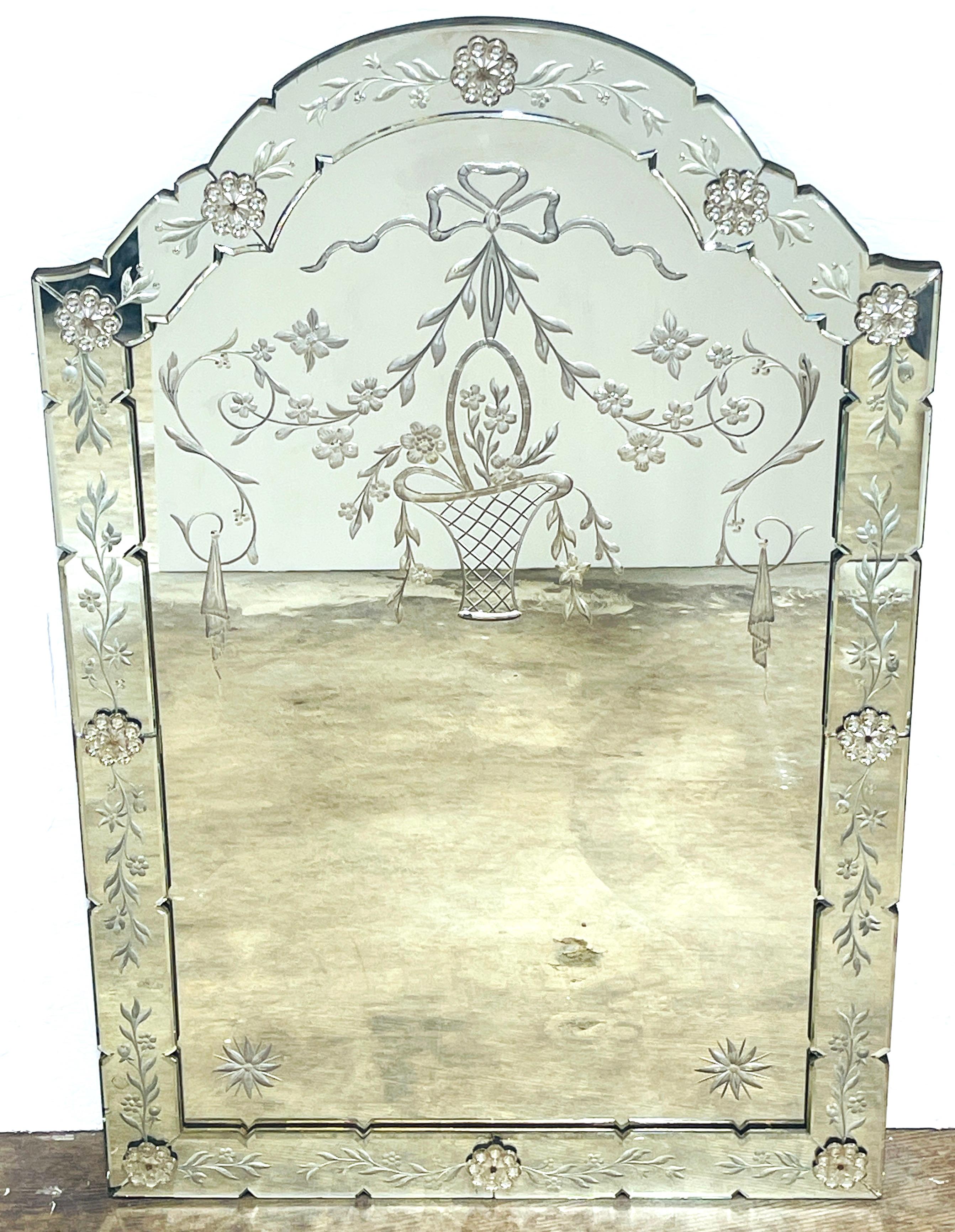 Stunning Venetian 'Rock Crystal' Engraved Neoclassical Mirror
Italy, circa 1920s 

The captivating allure of this stunning Venetian 'Rock Crystal' Engraved Neoclassical Mirror, a true testament to Italian craftsmanship from the 1920s. This exquisite