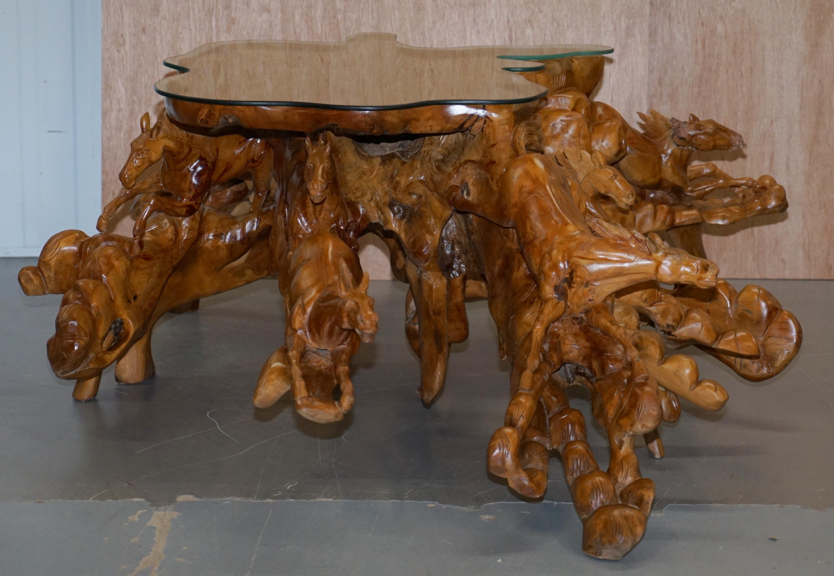 We are delighted to offer for sale this lovely one of a kind hand carved Equestrian Galloping Horse Root wood carved coffee table 

This table is part of a suite, I have two pairs of matching side tables listed under my other items

This is a