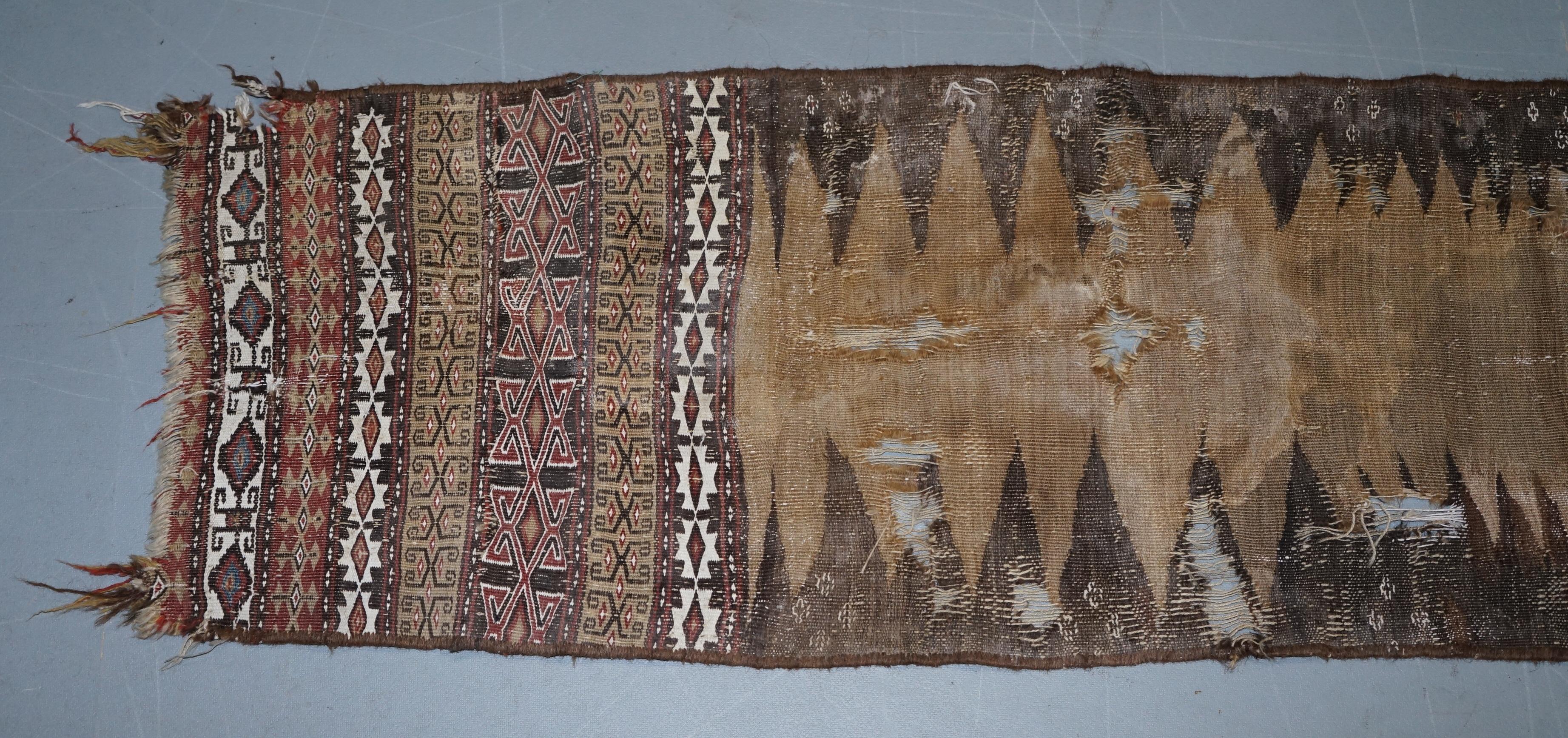 We are delighted to offer for sale this original antique Native American Kilim wall hanging 

The one is a nice wall hanging but can be used as a small rug, its in lovely order and looks very decorative, its heavily distressed and worn which adds