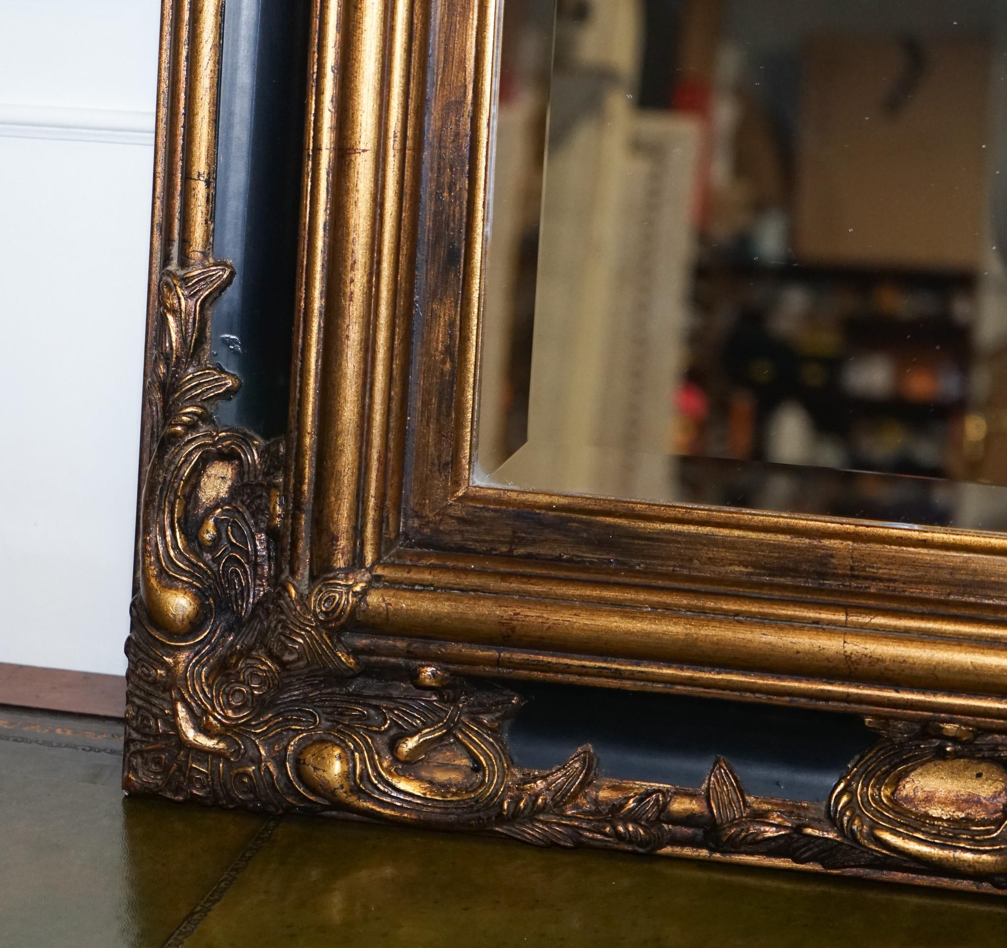 20ième siècle MIRROR VICTORIAN BLACK & GOLD CARVED FRAME BEVELLED en vente
