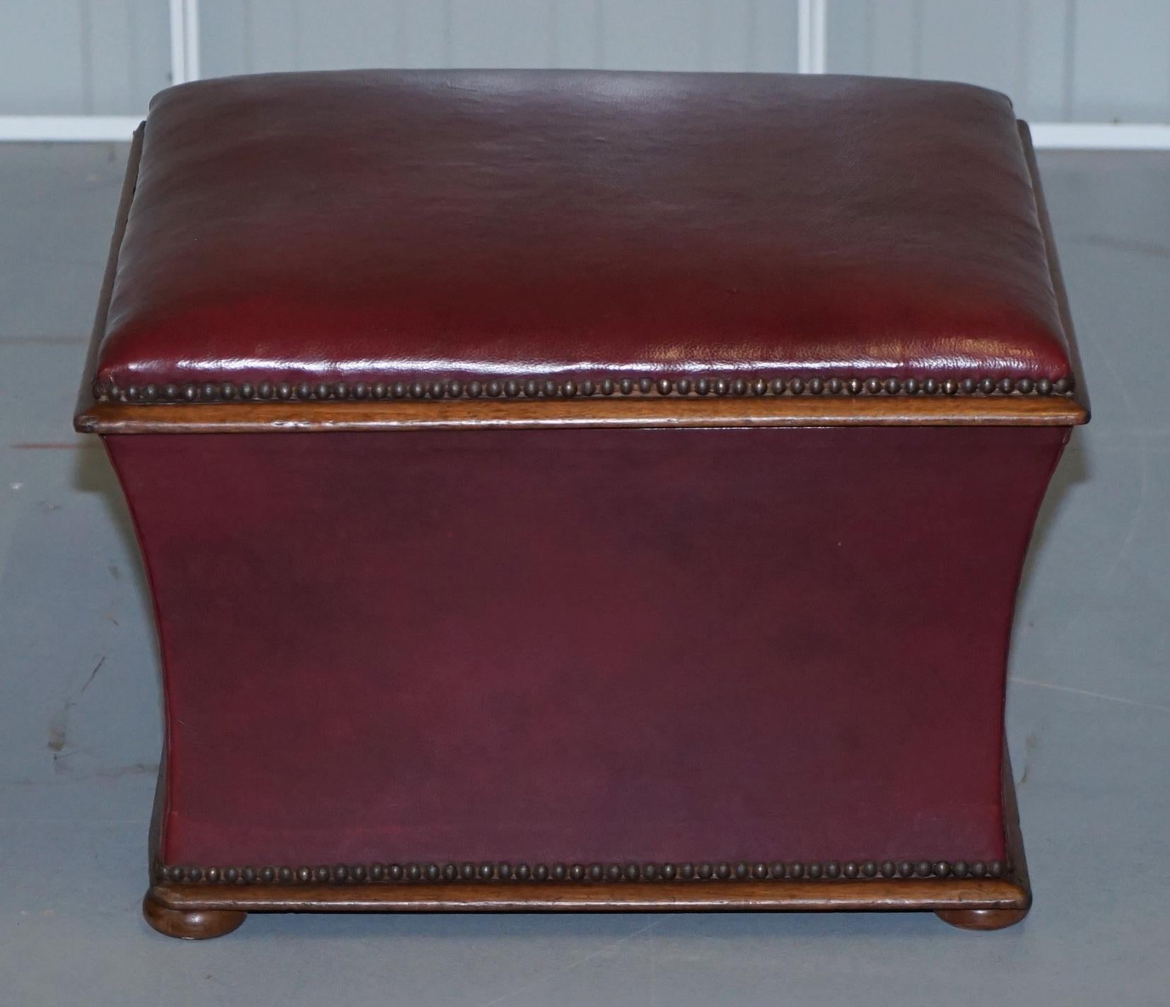 We are delighted to offer for auction this stunning original Victorian walnut and oxblood leather ottoman with internal storage

A very good looking and well made period stool, circa 1860, the frame is all solid walnut and its upholstered with