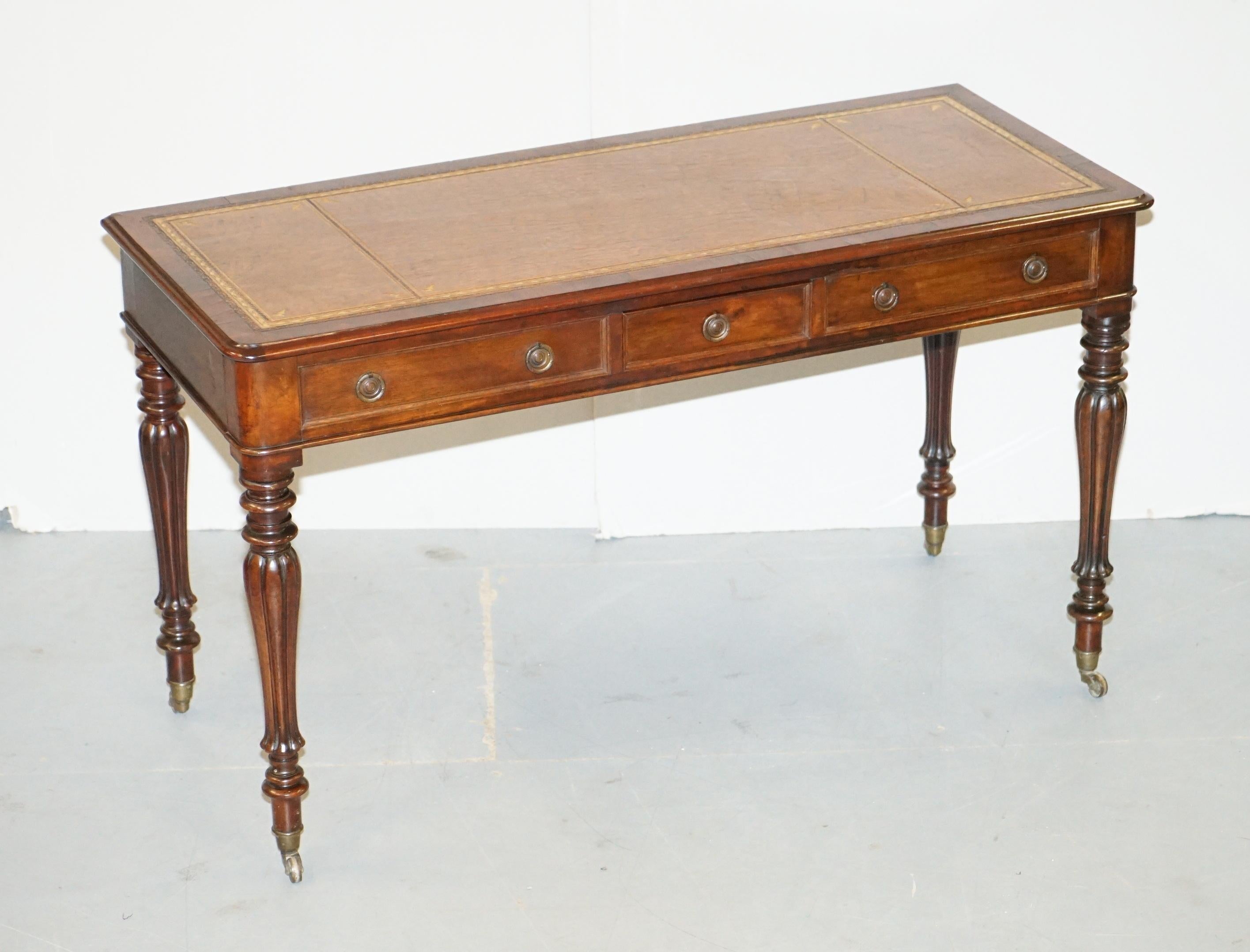 We are delighted to offer for sale this stunning Victorian library table writing desk with brown leather gold leaf tooled writing surface and Gillows style reeded legs 

A very fine piece of Victorian Library furniture. Its quite slim which makes