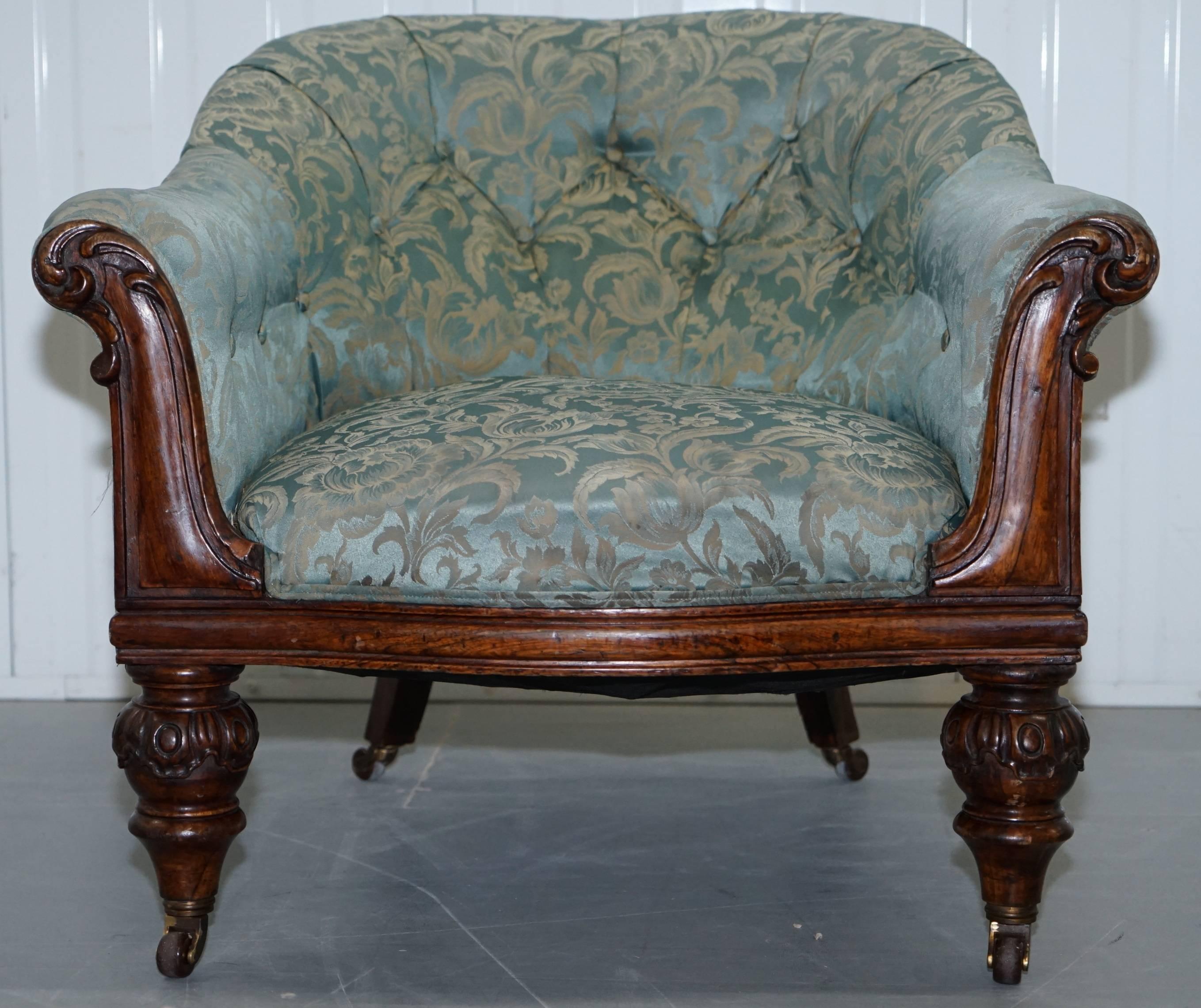 We are delighted to offer for sale this absolutely stunning Redwood hand-carved frame with silk upholstery and chesterfield buttons Victorian tub armchair

What an absolutely stunning and sculptural looking armchair, the legs are heavily carved,