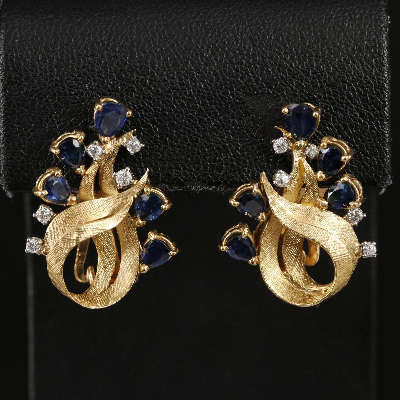 Mint Vintage Condition

Materials:	14K Gold, Palladium
Earring Type:	Non-Pierced, Drop
Earring Closure Type:	Clip-On
Hallmarks:	14K
Total Weight (grams):	10.70
 	 
Primary Stone(s) Type:	Sapphire
Primary Stone(s) Shape:	Pear, Faceted
Primary