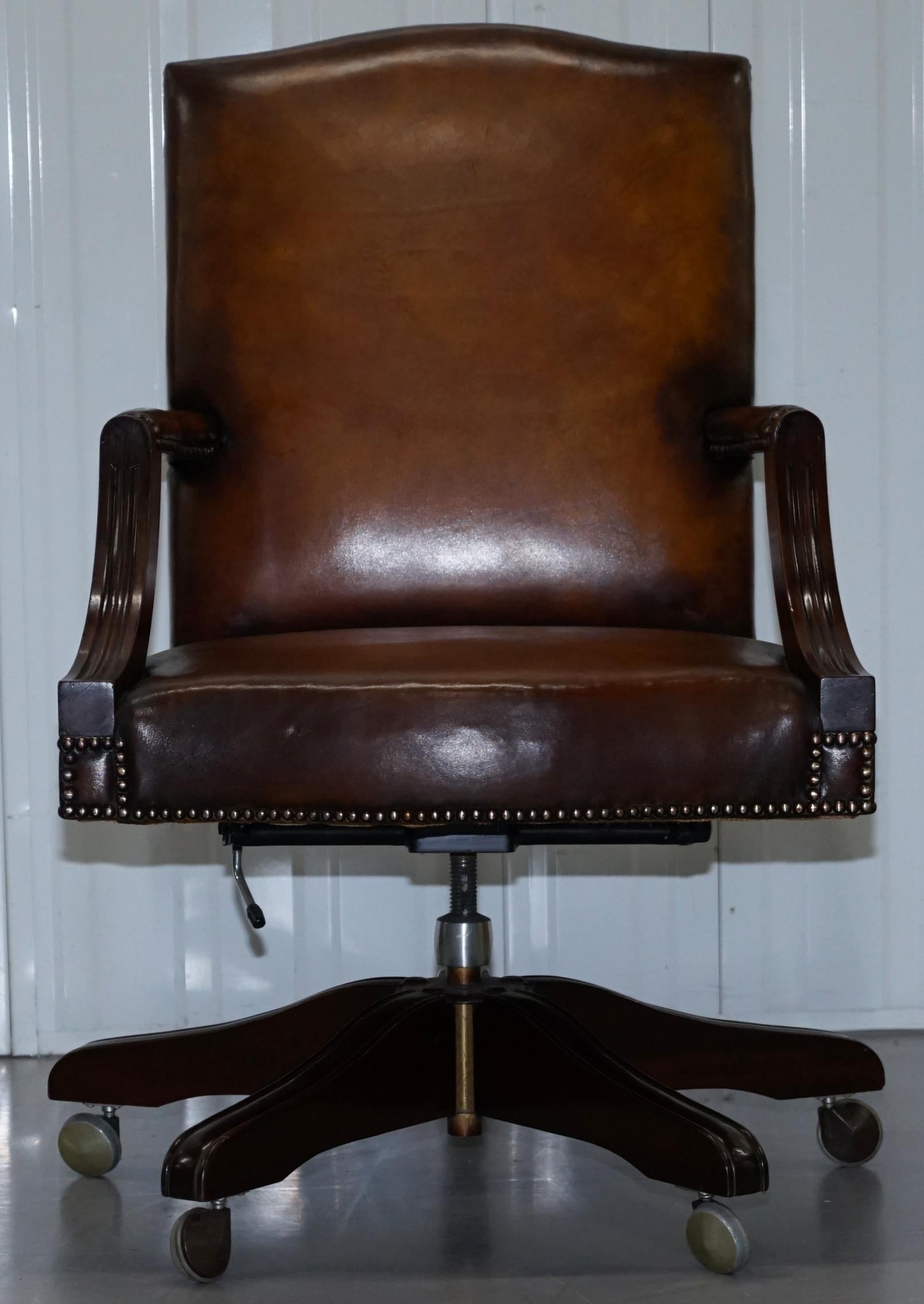 We are delighted to offer for sale this lovely fully restored hand dyed Gainsborough office chair, circa 1960.

A stunning and very comfortable chair, it has been fully restored to include a new leather seat base, the old colour has been stripped