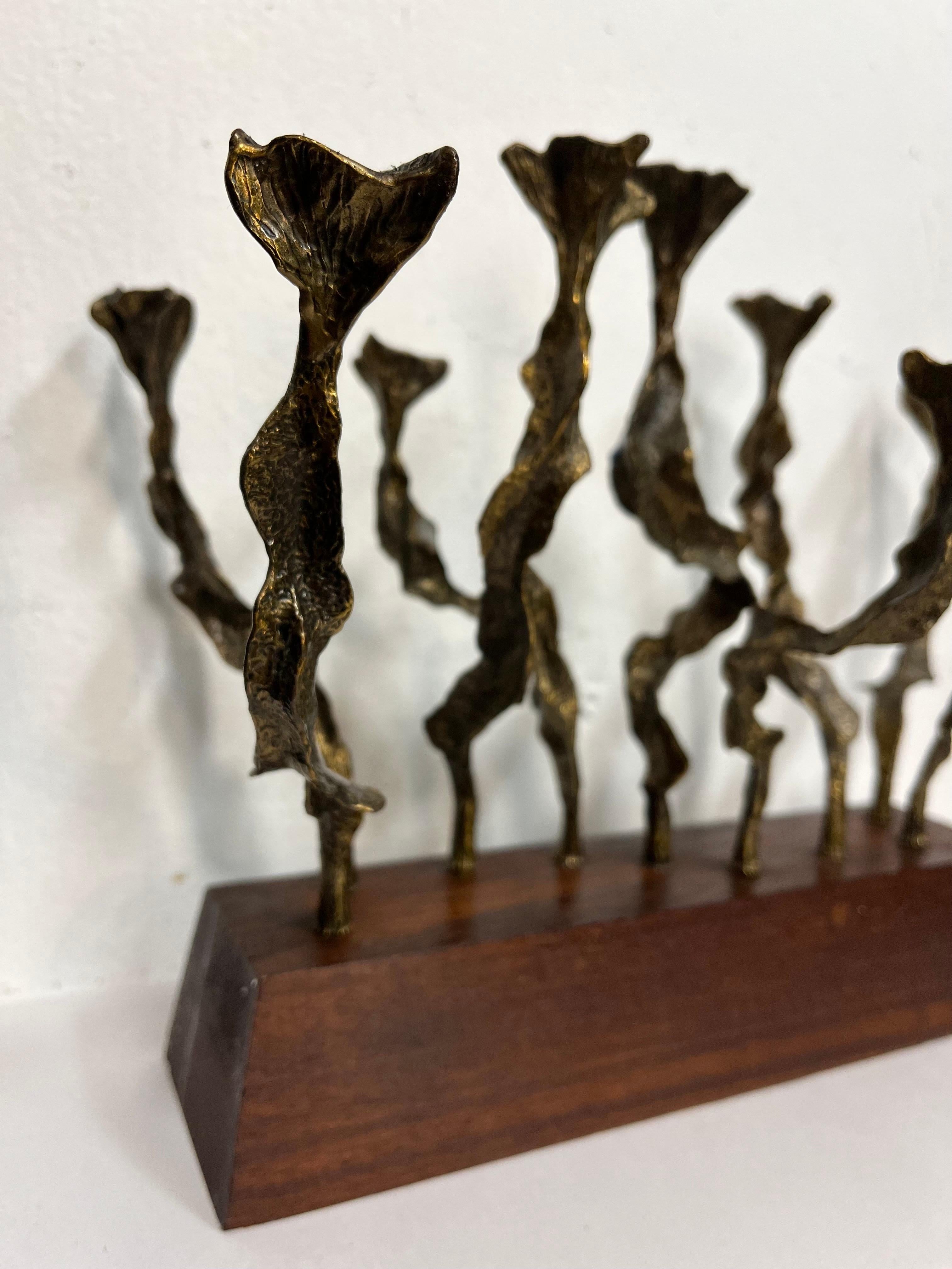 Cast Stunning Vintage Brutalist Sculptural Menorah of Bronze on Wood Base by Berman