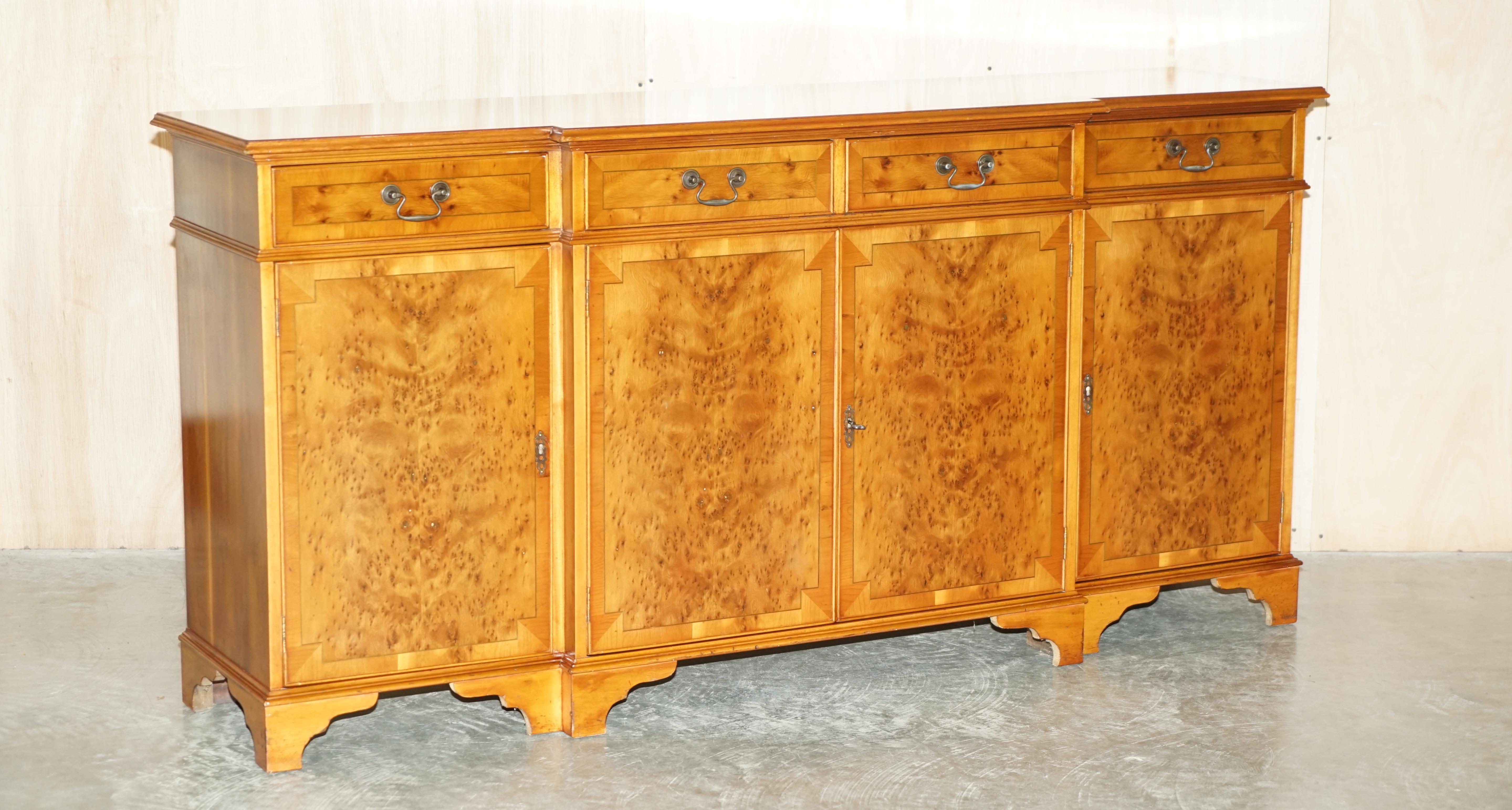 We are delighted to offer for sale this exquisite, Burr and Burl Walnut Breakfront sideboard with four large drawers to the top

A very good looking and well made piece, this is basically art furniture, the grain of timber in the right light