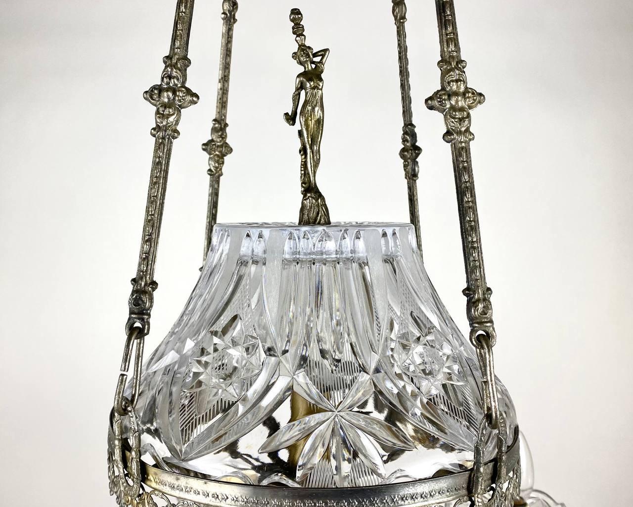 Large lead crystal and brass chandelier with 6 horns.
France, 1950s.
Made of high-quality crystal with a lead content of over 30% (these indicators characterize modern Swarovski crystals).
The body of the chandelier is made of hand forged and