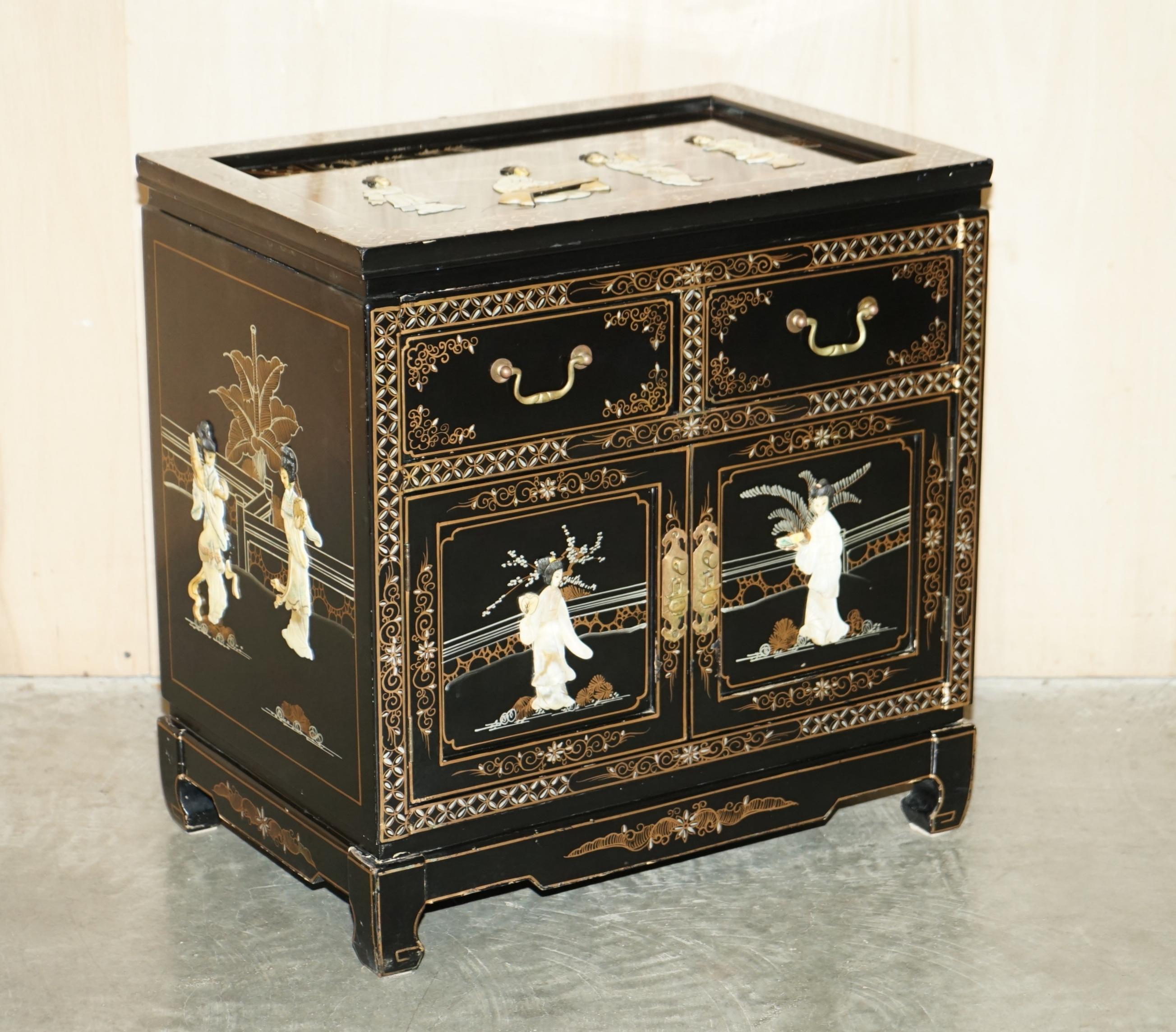 Royal House Antiques

Royal House Antiques is delighted to offer for sale this lovely vintage Chinese side cabinet with native scenes of Geisha girls carved out of soapstone and decorated in the Chinoiserie style

Please note the delivery fee listed