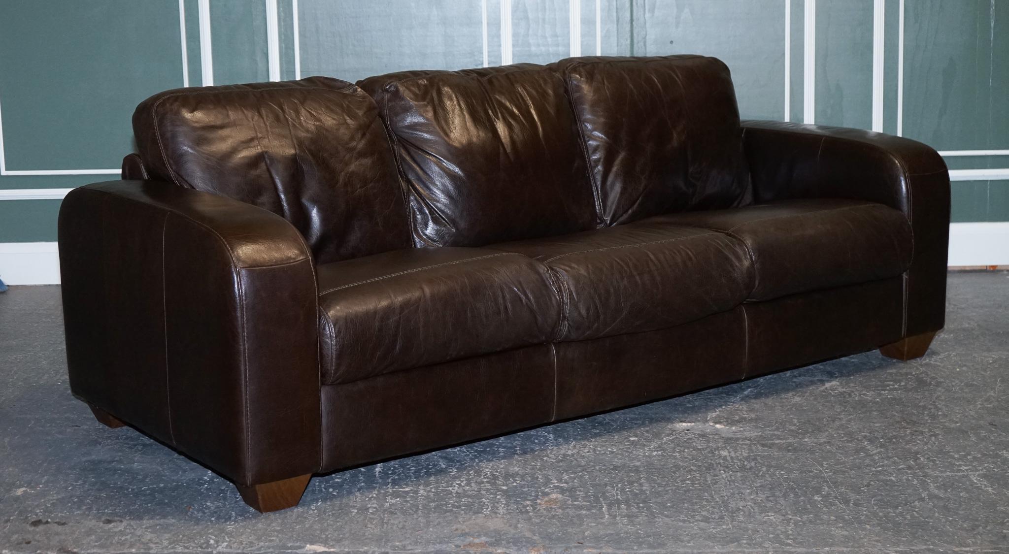 We are delighted to Present This Stunning Chocolate Brown Leather Three Seater Sofa.

The sofa is made by Sofitalia which is an established Italian company.

The leather is of very good Italian cow-hide quality and still has plenty of life to