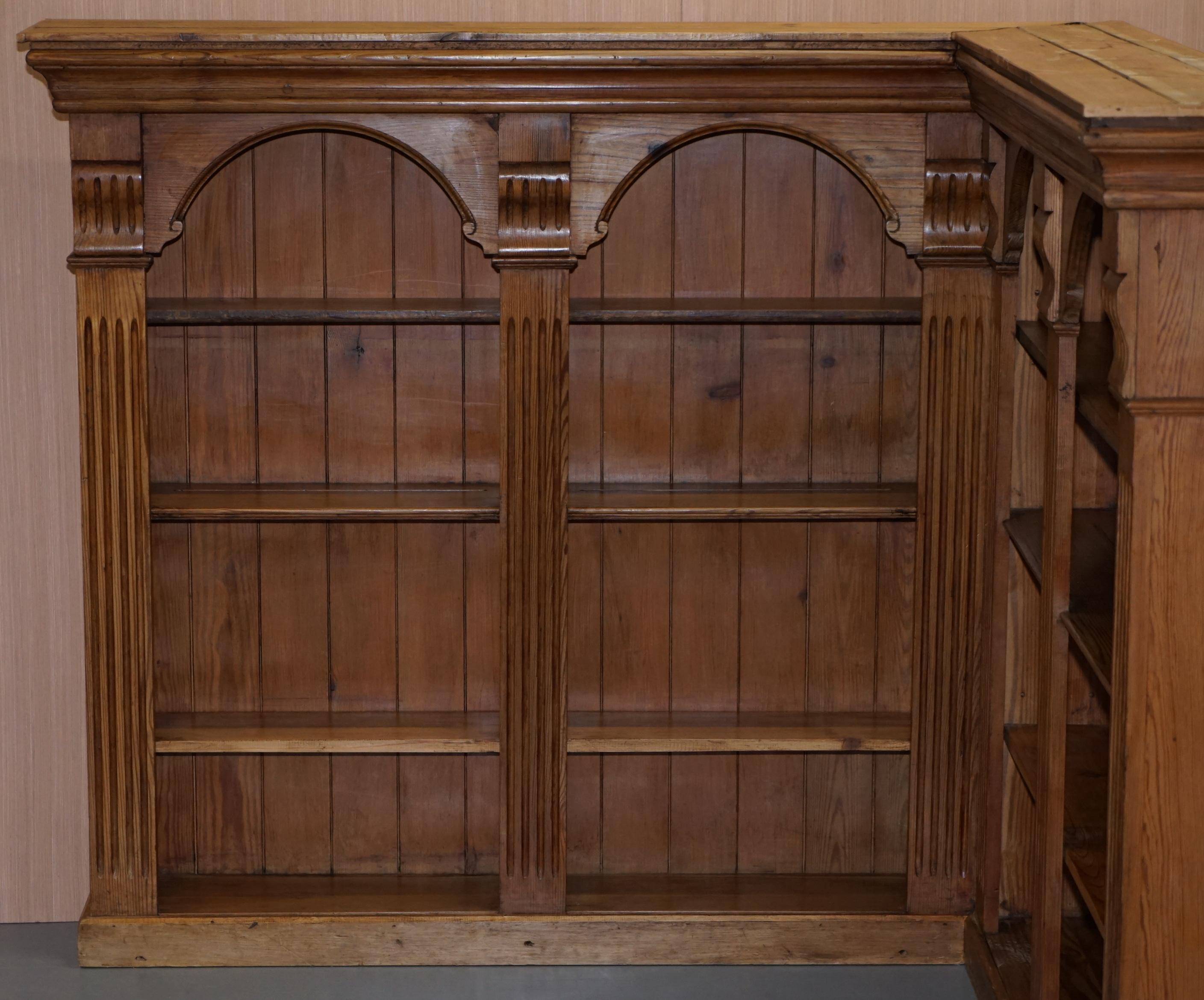 We are delighted to offer for sale this lovely circa 1950s solid English pine corner bookcase

A very good looking well made and functional piece of furniture. I’ve not seen one like this before, it has nicely carved detailing and arches tops. The