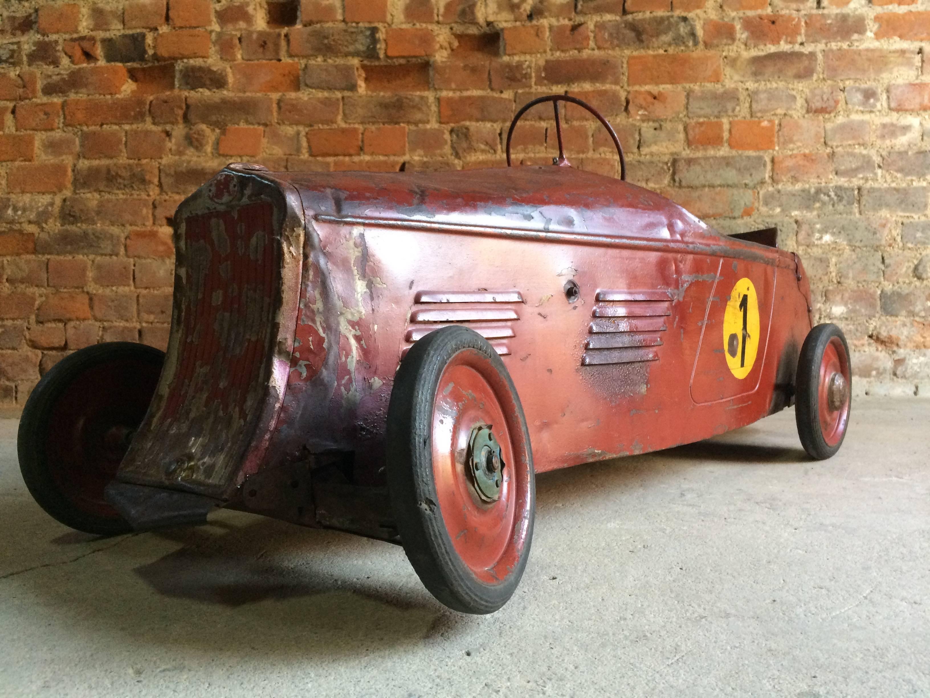 Fabulous vintage French Delage 'Boat Tail' racer pedal car, circa 1935, extremely rare and beautifully patinated, manufactured in France by Eureka, ideal for that loft space wall.

Dimensions:

Height 14” inches

Width 14” inches

Length 50”