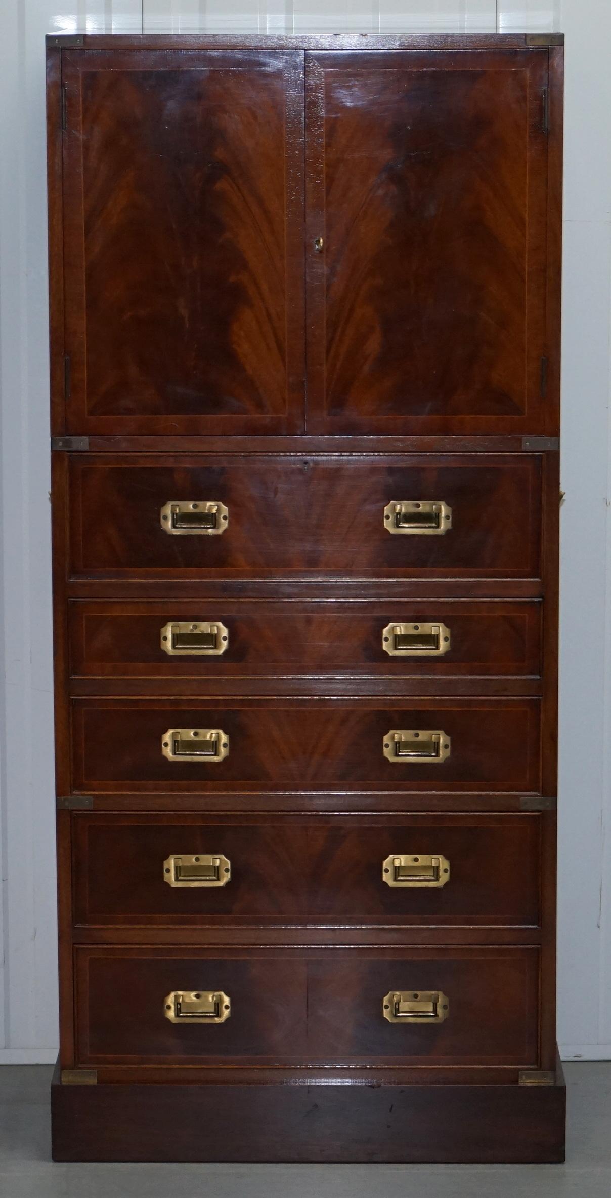 We are delighted to offer for sale this very good looking and well-made antique Military campaign drinks cupboard in flamed mahogany with brass hard wear

A functional and decorative piece of furniture. Military campaign drinks cabinets never come