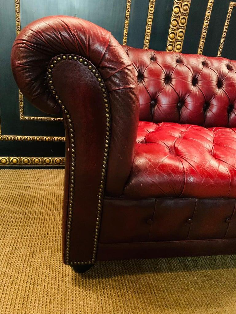 red chesterfield sofa