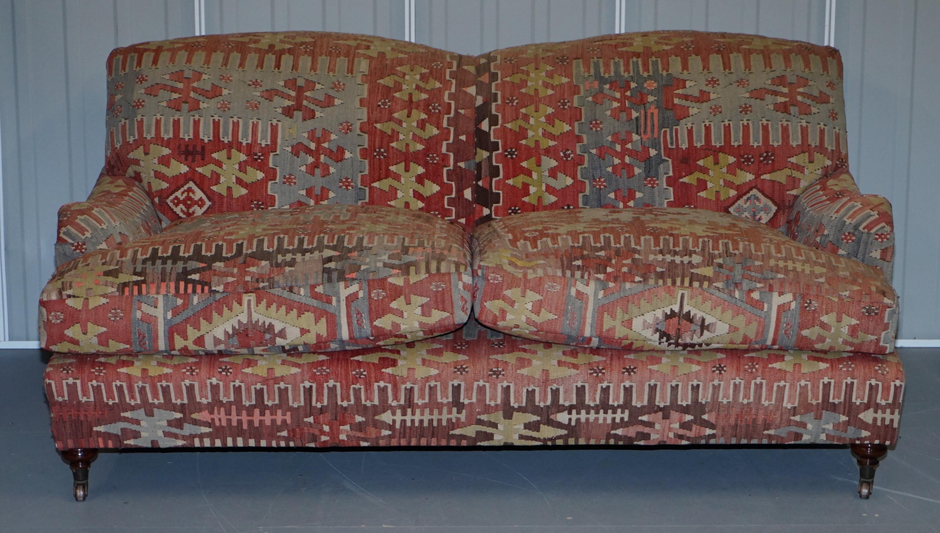 We are delighted to offer for sale this stunning vintage George Smith Kilim signature arm sofa with feather filled cushions

A very good looking and iconic sofa, hand made in England by the genius’s at George Smith

The sofa model is called the