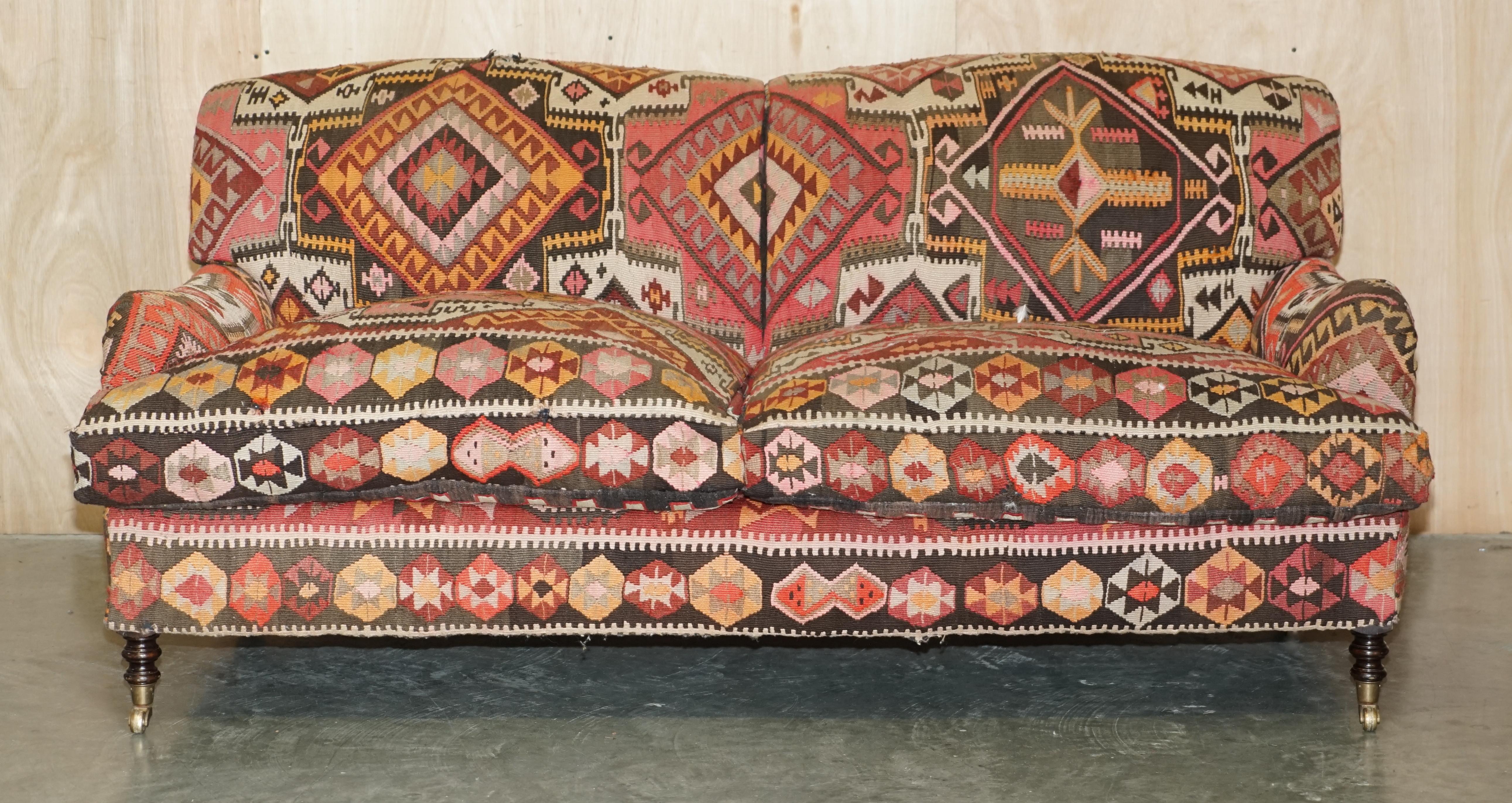 Royal House Antiques

Royal House Antiques is delighted to offer for sale this sublime original George Smith signature collection standard arm three-seat sofa upholstered with Aztec Kilims

Please note the delivery fee listed is just a guide, it