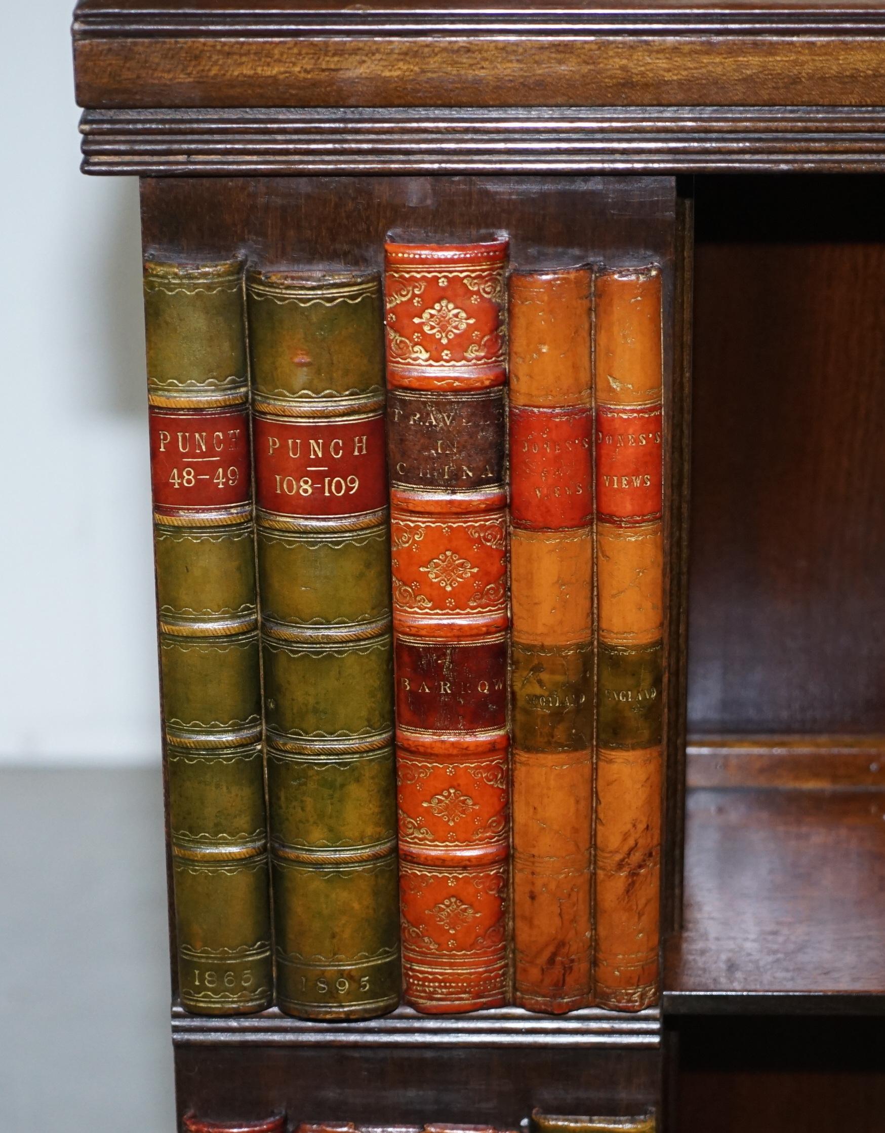 British Stunning Vintage Mahogany Revolving Swivel Bookcase on Wheels with Faux Books