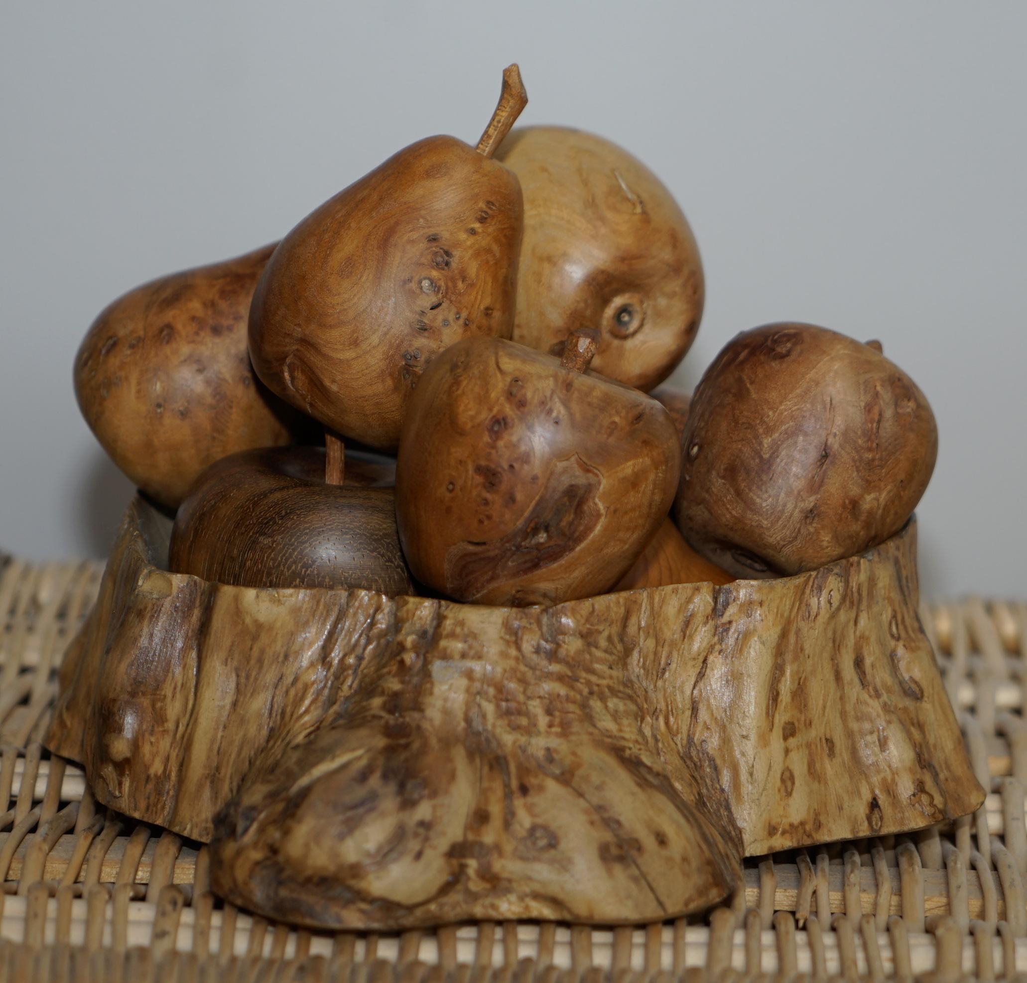 We are delighted to offer for sale this stunning vintage handmade route root burr walnut fruit bowl and a selection of burr elm and & walnut apples and pears

A selection of lovely hand carved fruit and natural very rare root wood bowl

These