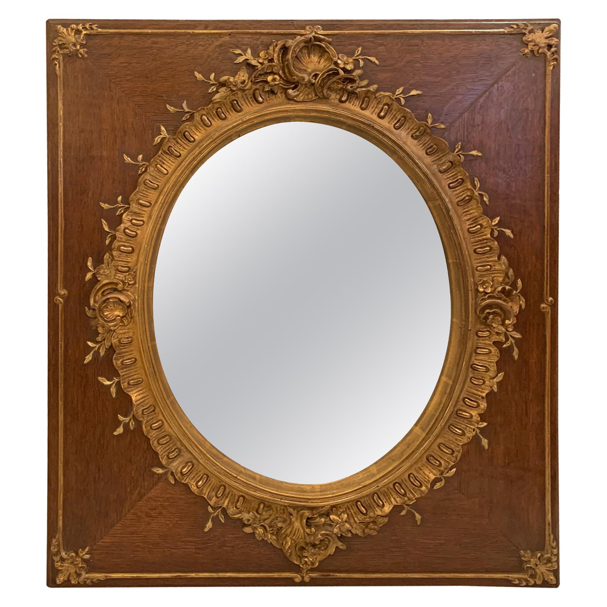 Superbe miroir vintage en chêne et bois doré en vente