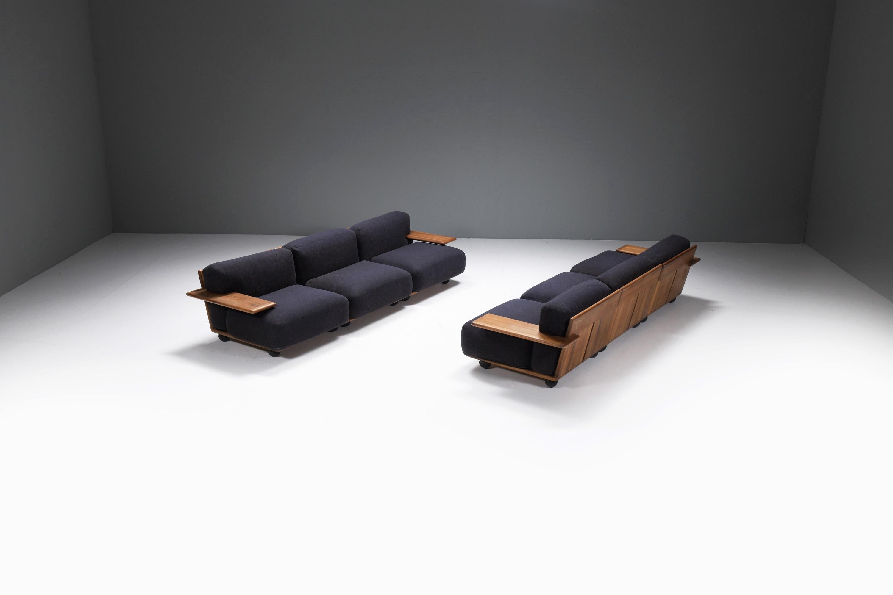 Stunning Pianura seating group.  A wooden structure with high comfort cushions in their original fabric.  The color is anthracite with a dark blue patina.  Matching set from its first owner.
Designed by Mario Bellini for Cassina in the 1970s l