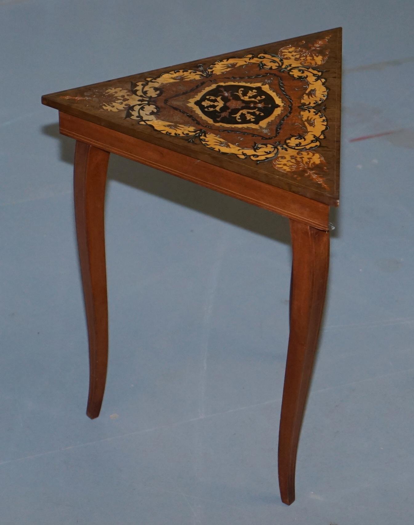 We are delighted to offer for sale this lovely marquetry inlaid small musical side table

A nice decorative side table that plays a lovely little tune

The table has been cleaned waxed and polished and is in good order throughout, the top has