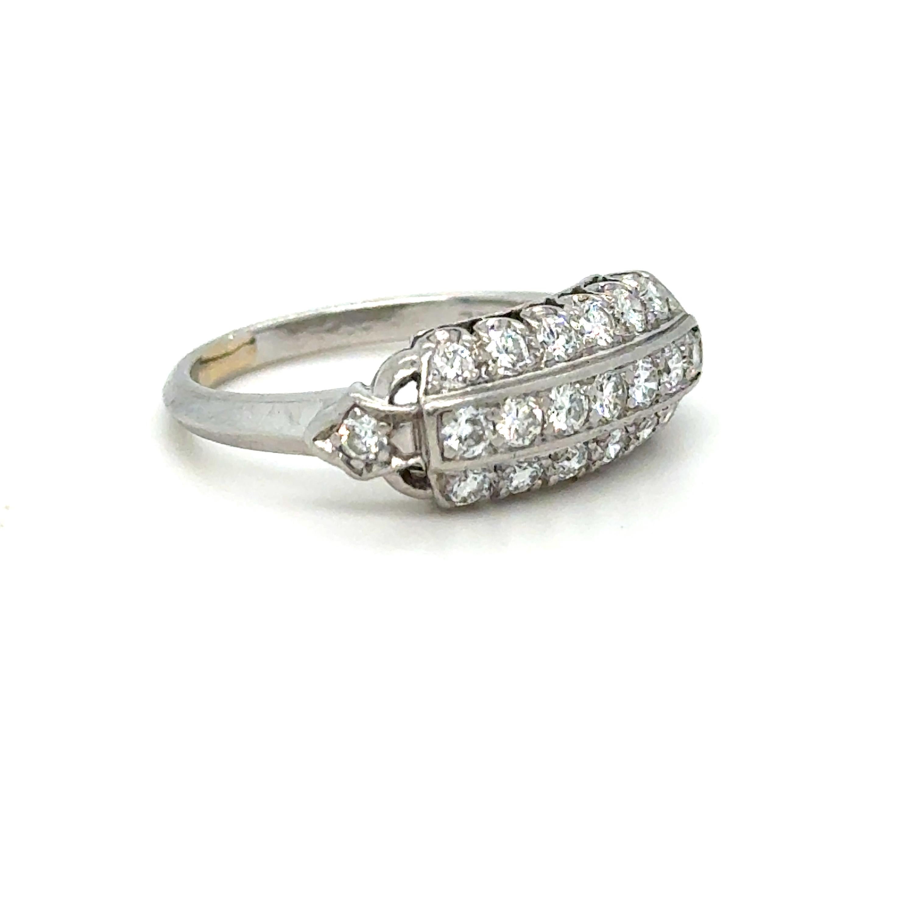 Before even picking up this Stunning Three Row Band in my hands, I recognized the high quality craftsmanship and the amazingly simple beautiful design. Crafted in Platinum, the design is a Three Row design, finished with a  beautiful Art Deco band.